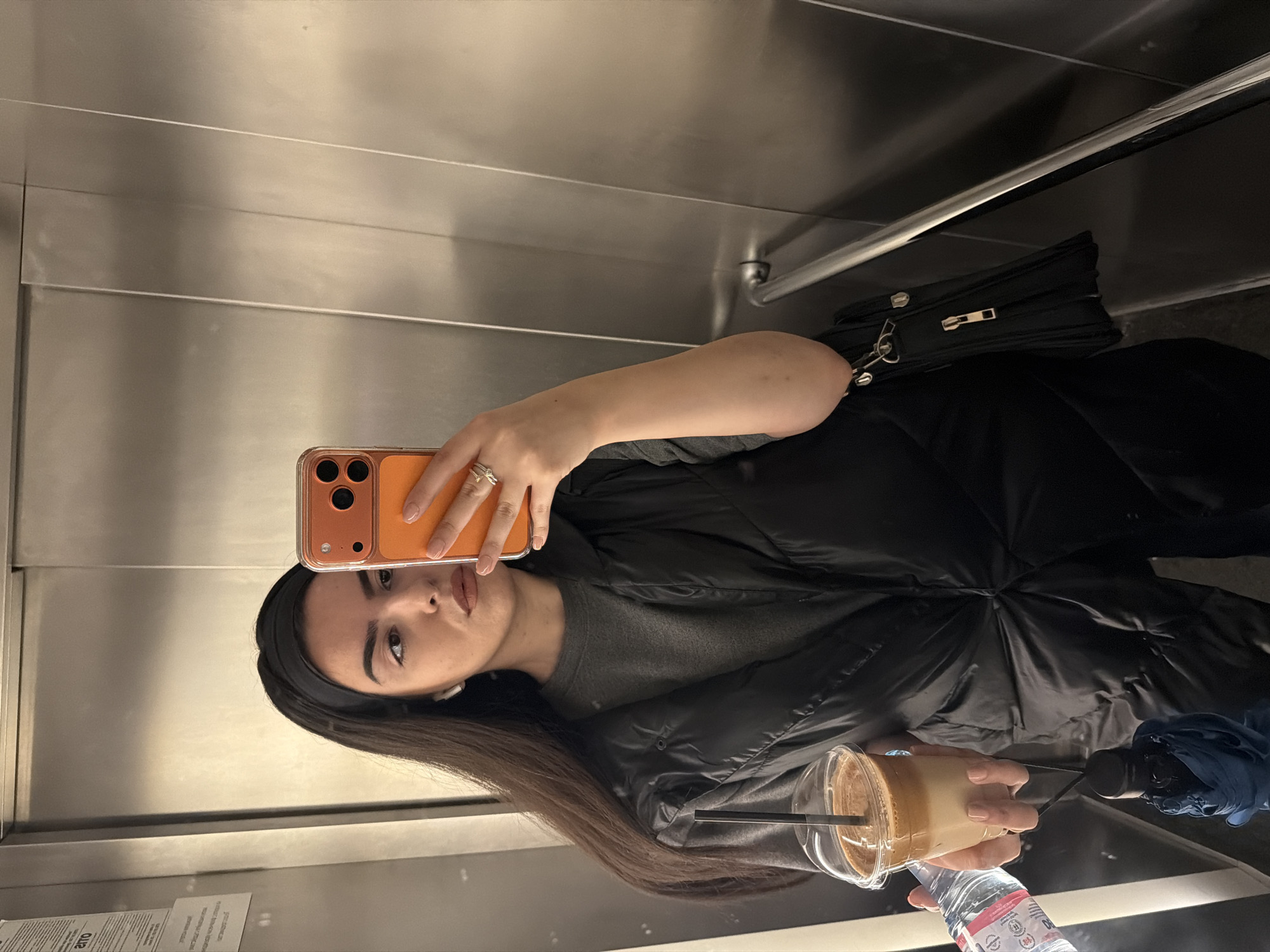 Woman takes elevator selfie in Sofia, Bulgaria