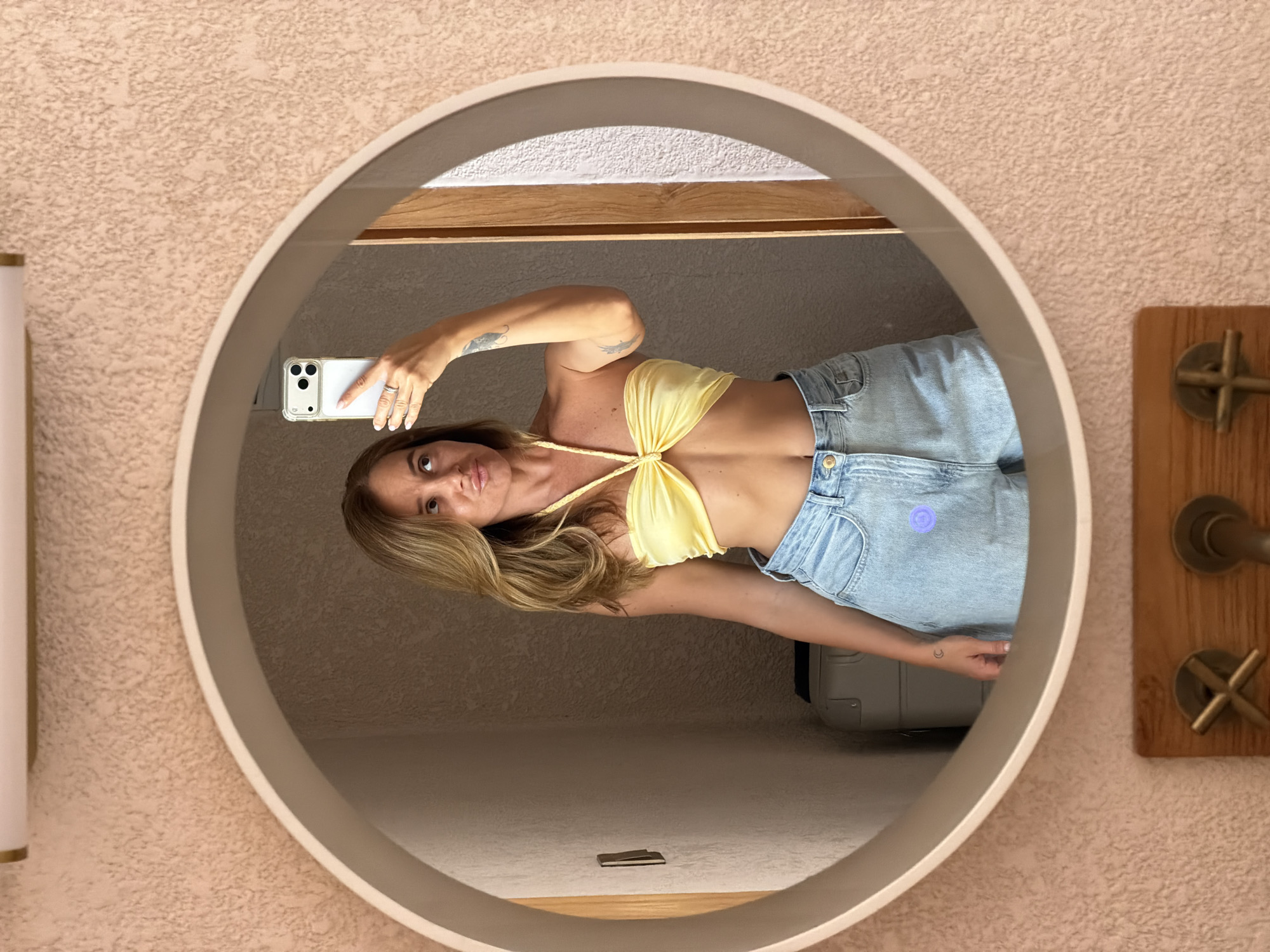Mirror selfies around a Mengwi villa, same outfit, two rooms