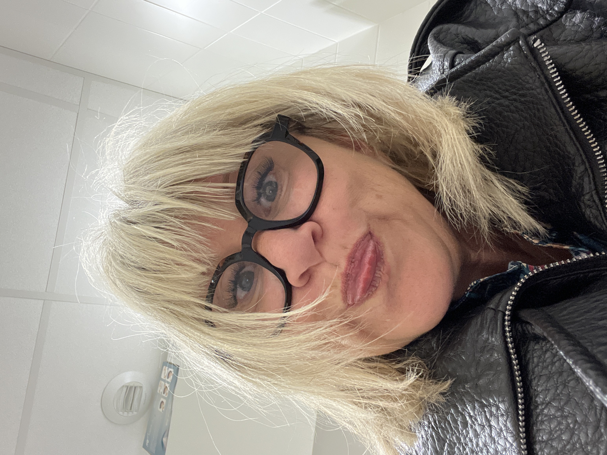 Woman in glasses photographed in La Fouillouse, France