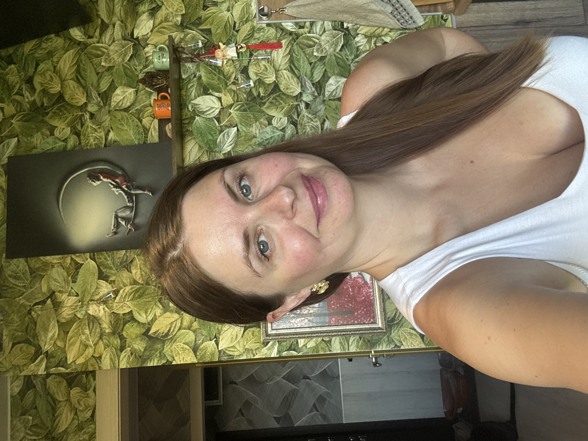 Selfie, curious cat, and a crescent moon sculpture