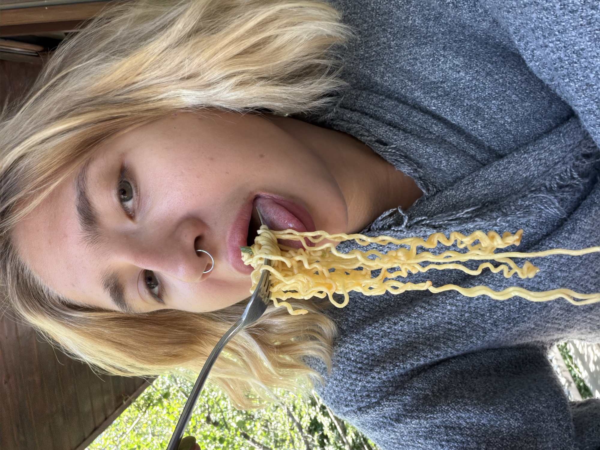 Balcony morning in Tbilisi: noodles, Coke, and video editing