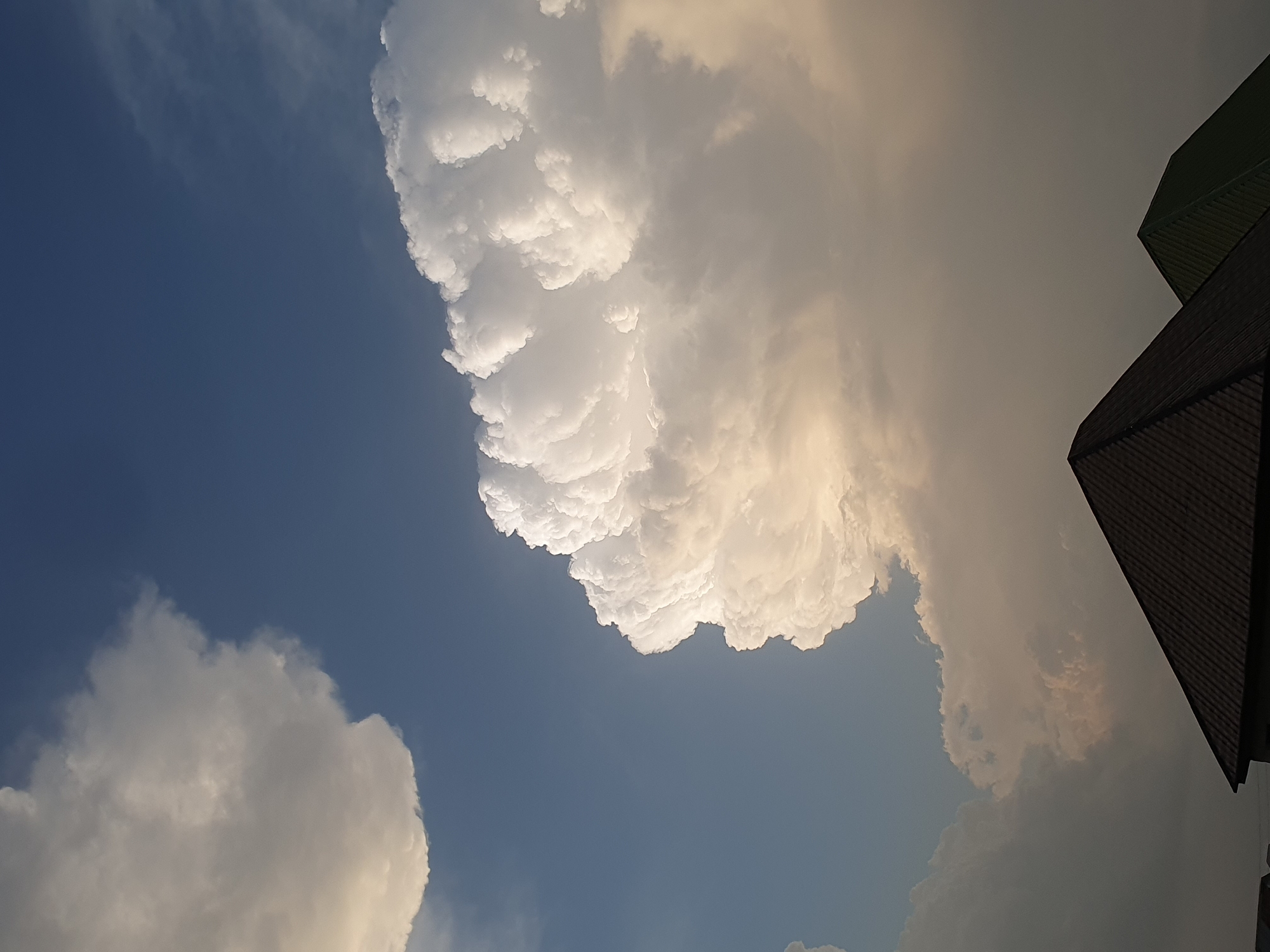 Partly cloudy skies with cumulus clouds observed