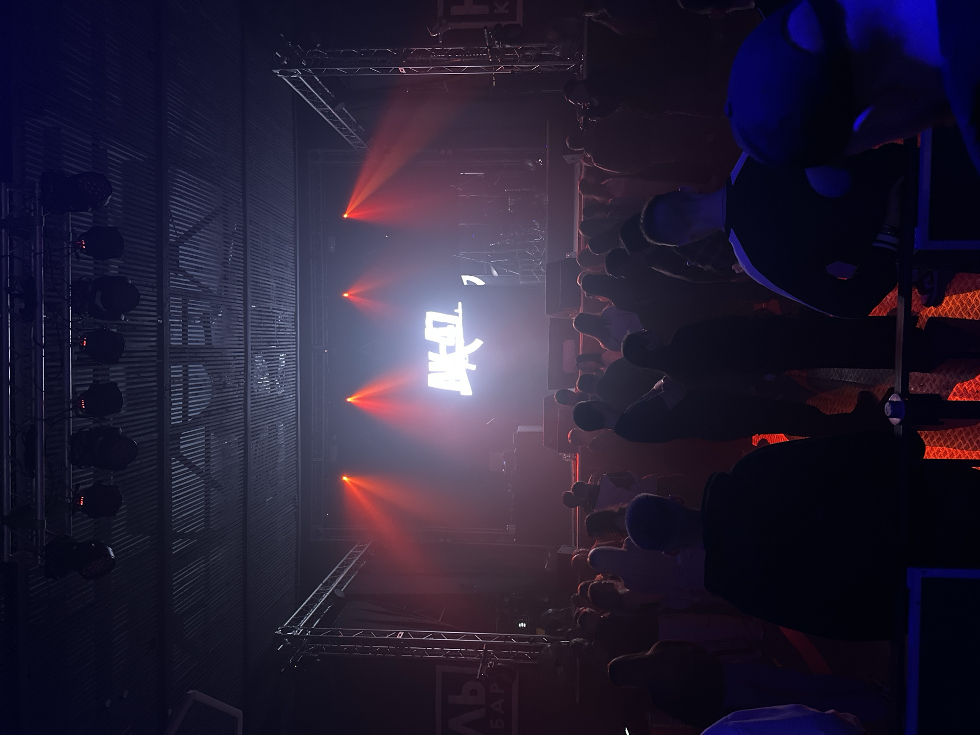 Concert with red lighting captured in Izhevsk venue