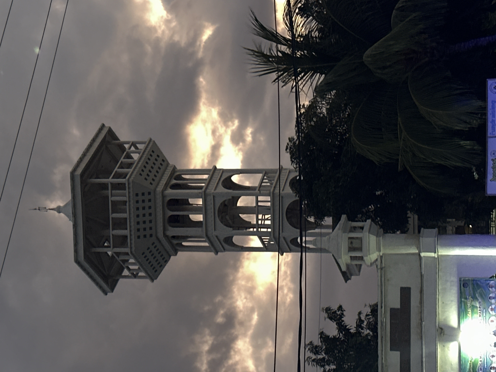 Indonesian minaret and beachside recreation area documented by witness