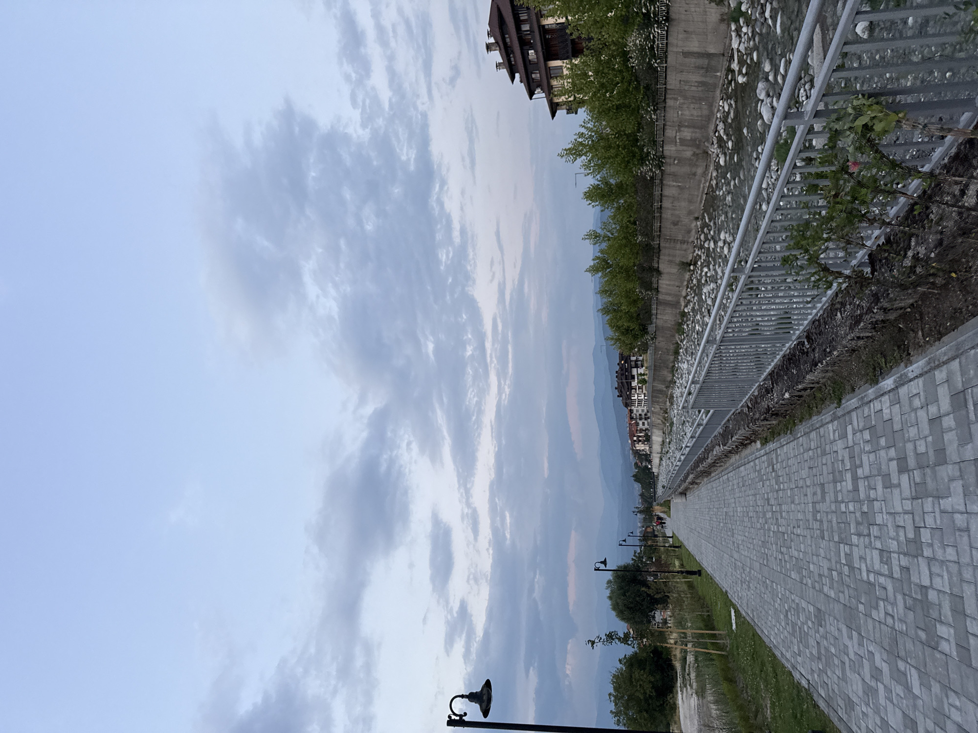 Bansko streets and skyline at sunset, August 2026