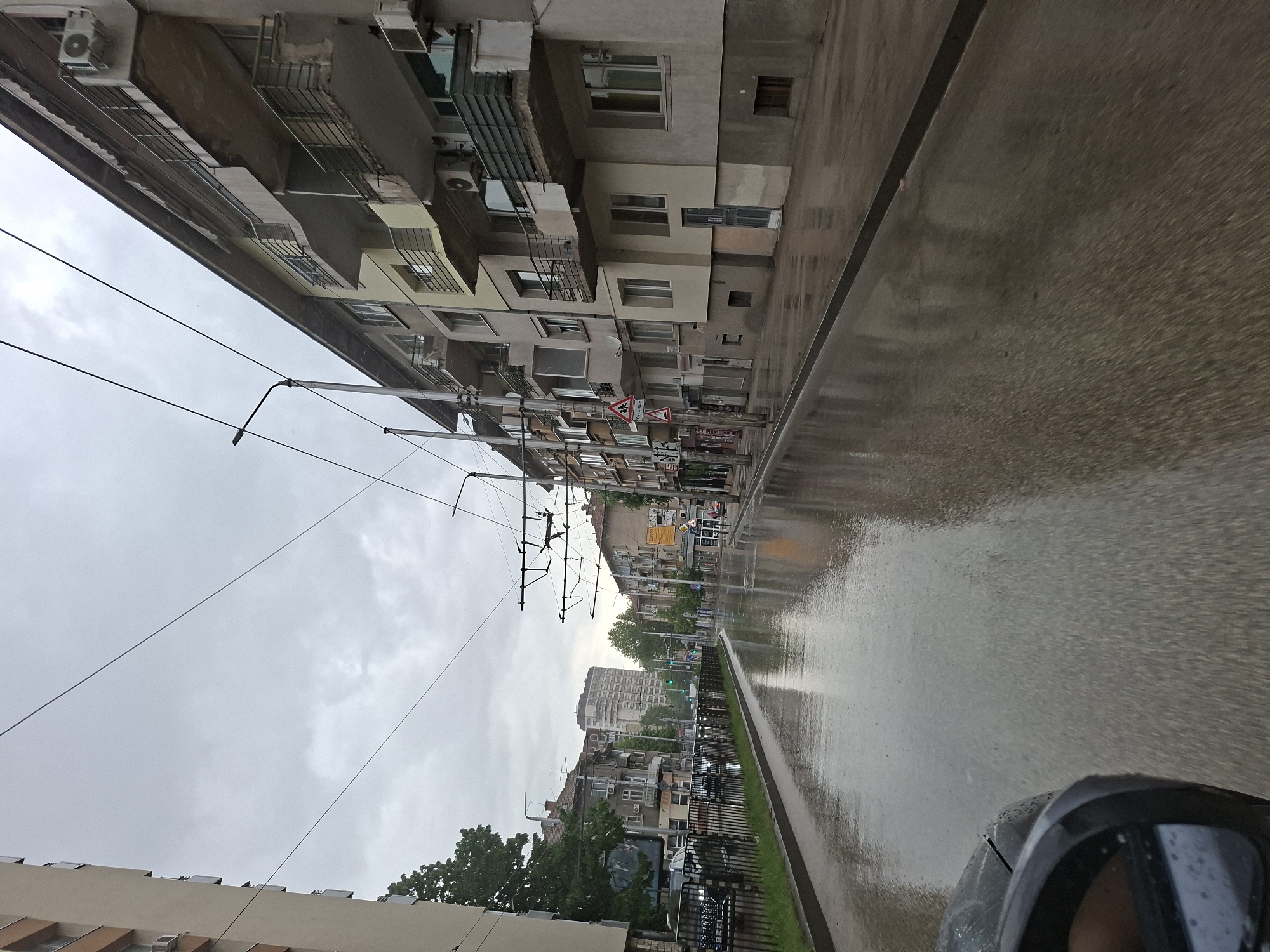 Rainy day captured on Pleven street with wet pavement