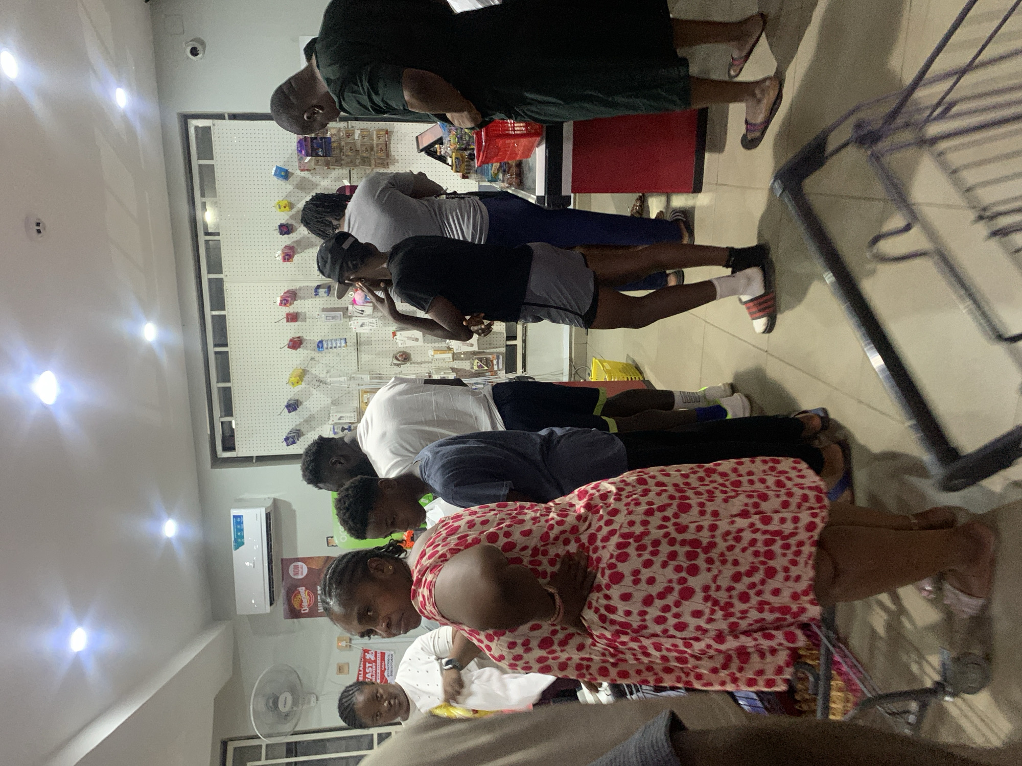 Evening shopping activity captured at Abuja supermarket checkout lines