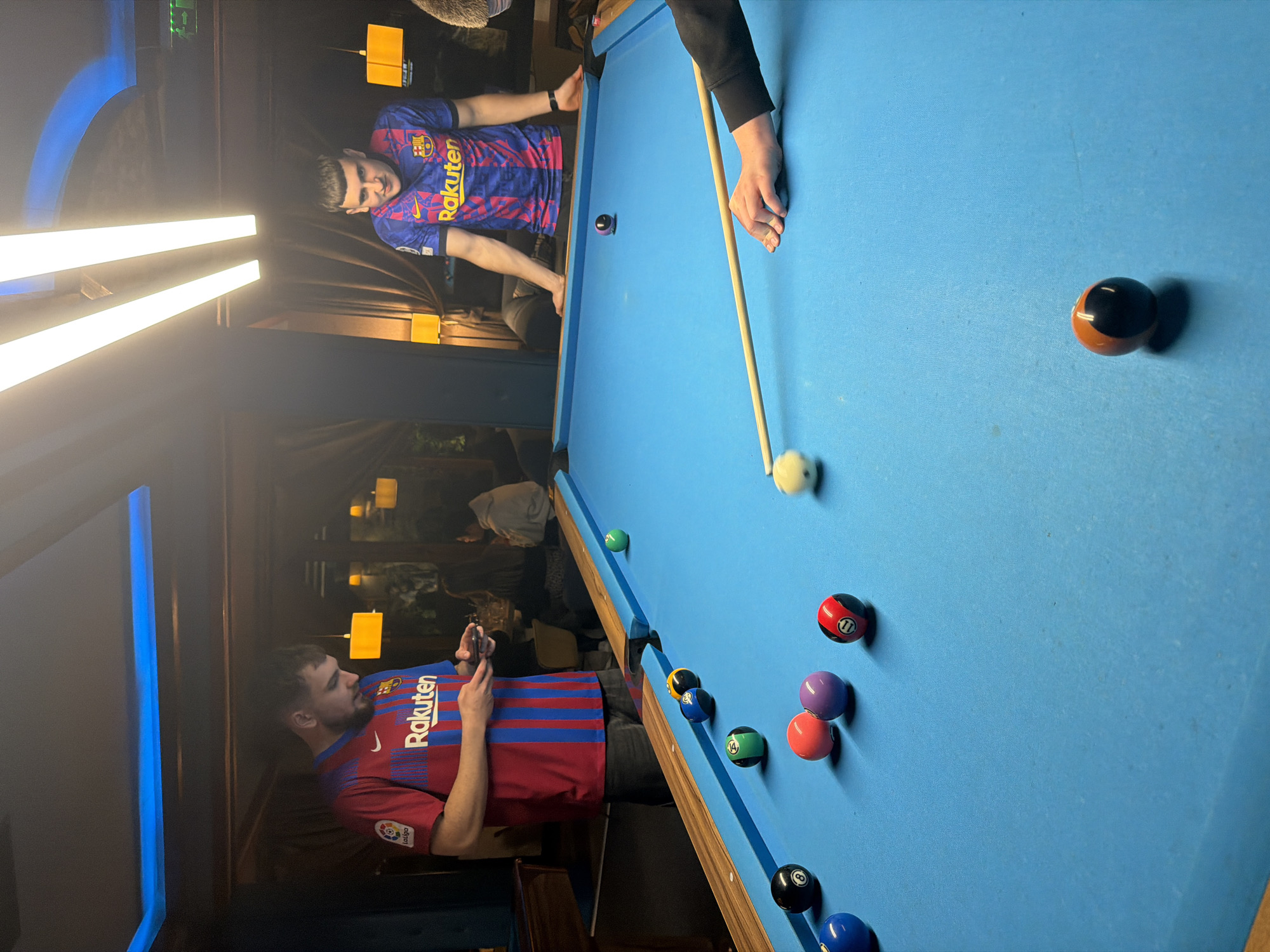Barcelona fans play pool at Plovdiv bar