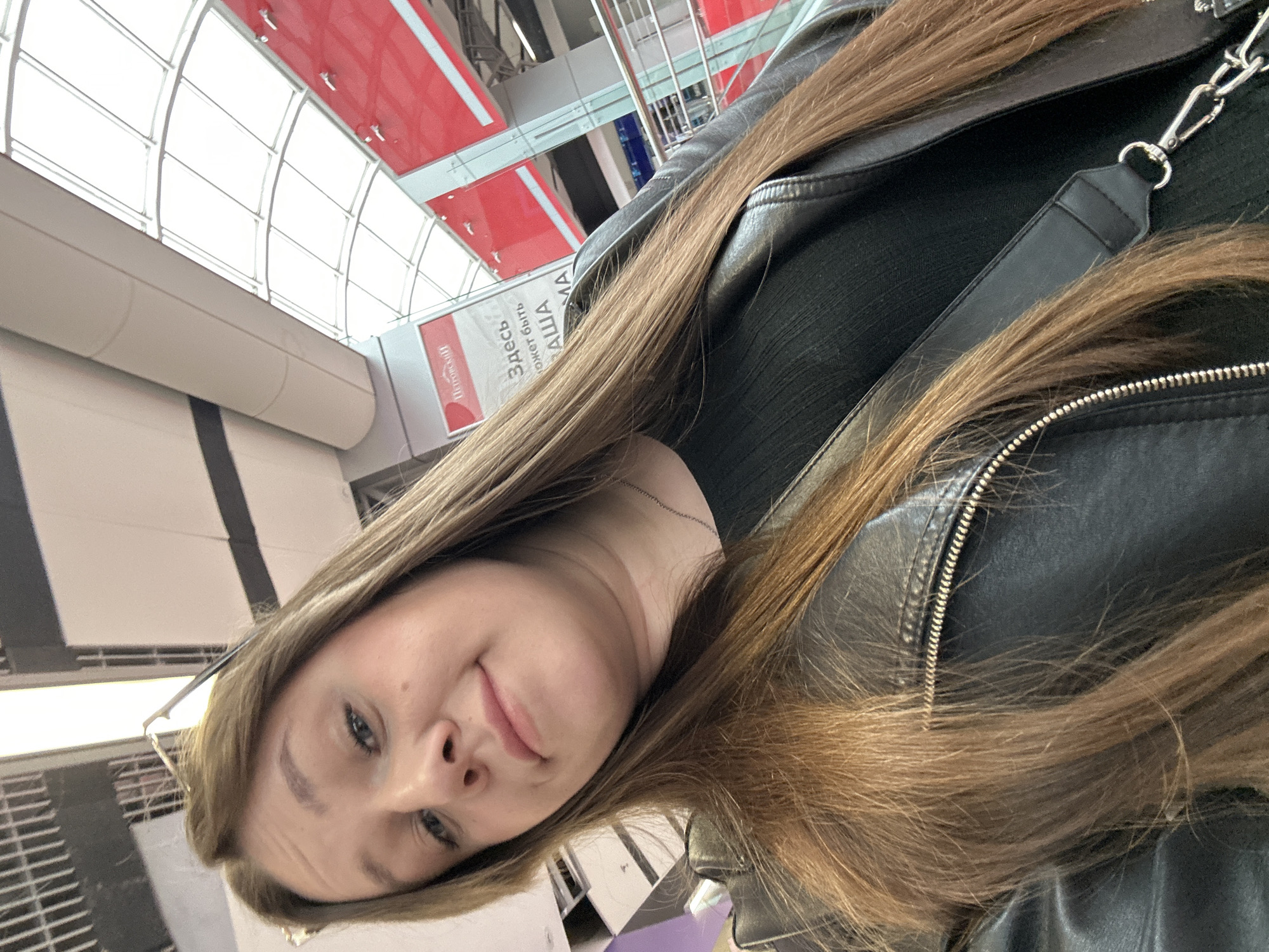 Women take selfies in modern Izhevsk public restroom