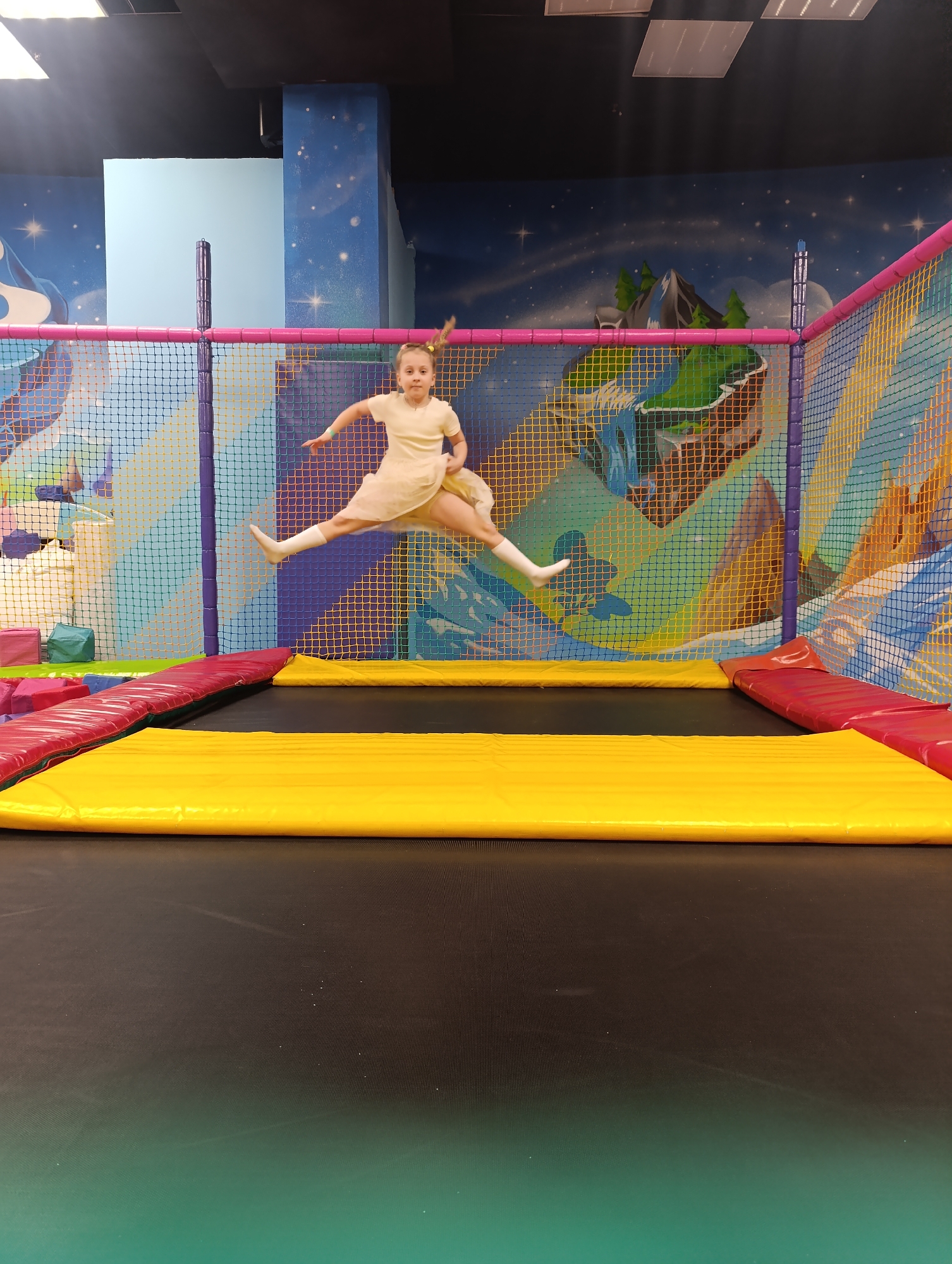 Child plays on trampoline at Noginsk indoor playground