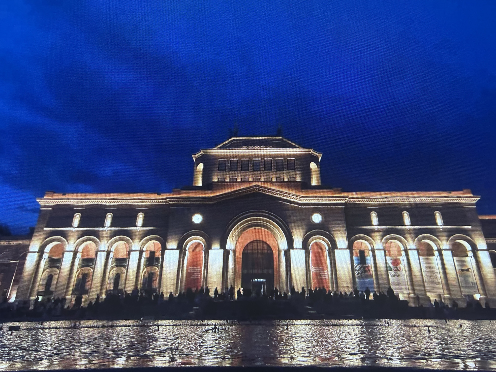 Republic Square and the National Gallery lit up at dusk