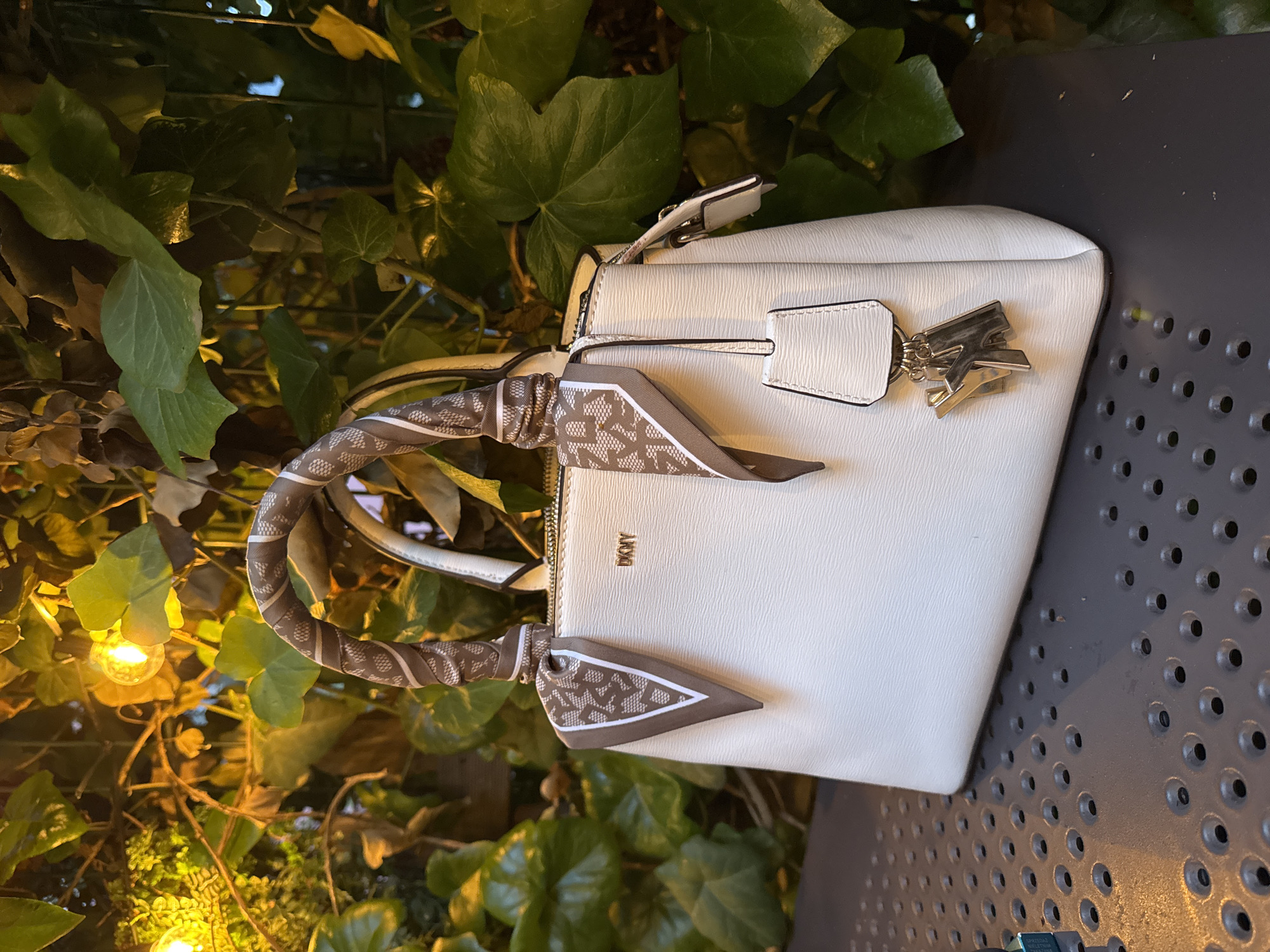Evening scenes captured at establishment with handbag, cocktails, lighting