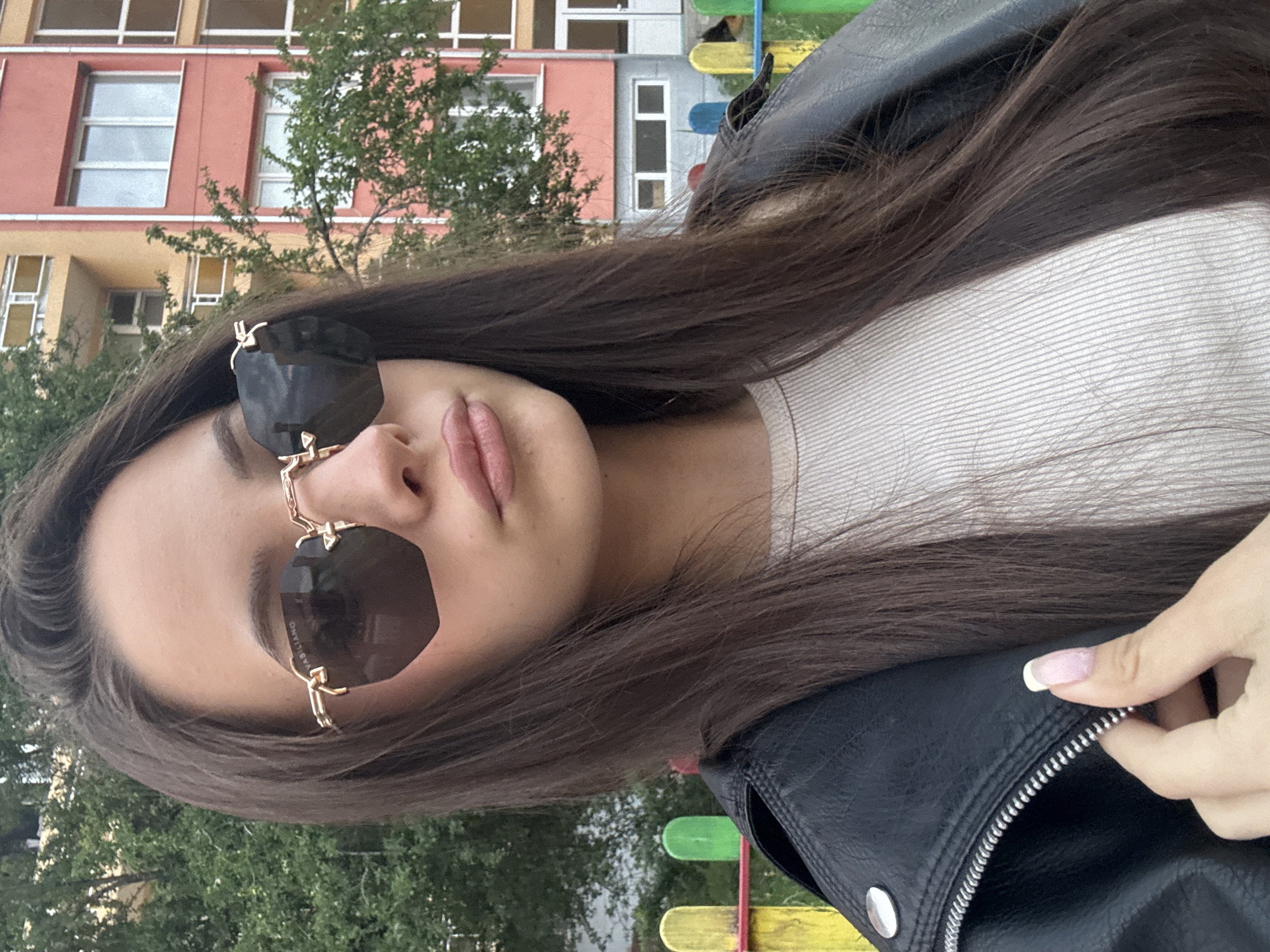 Woman photographed multiple times at unknown playground location