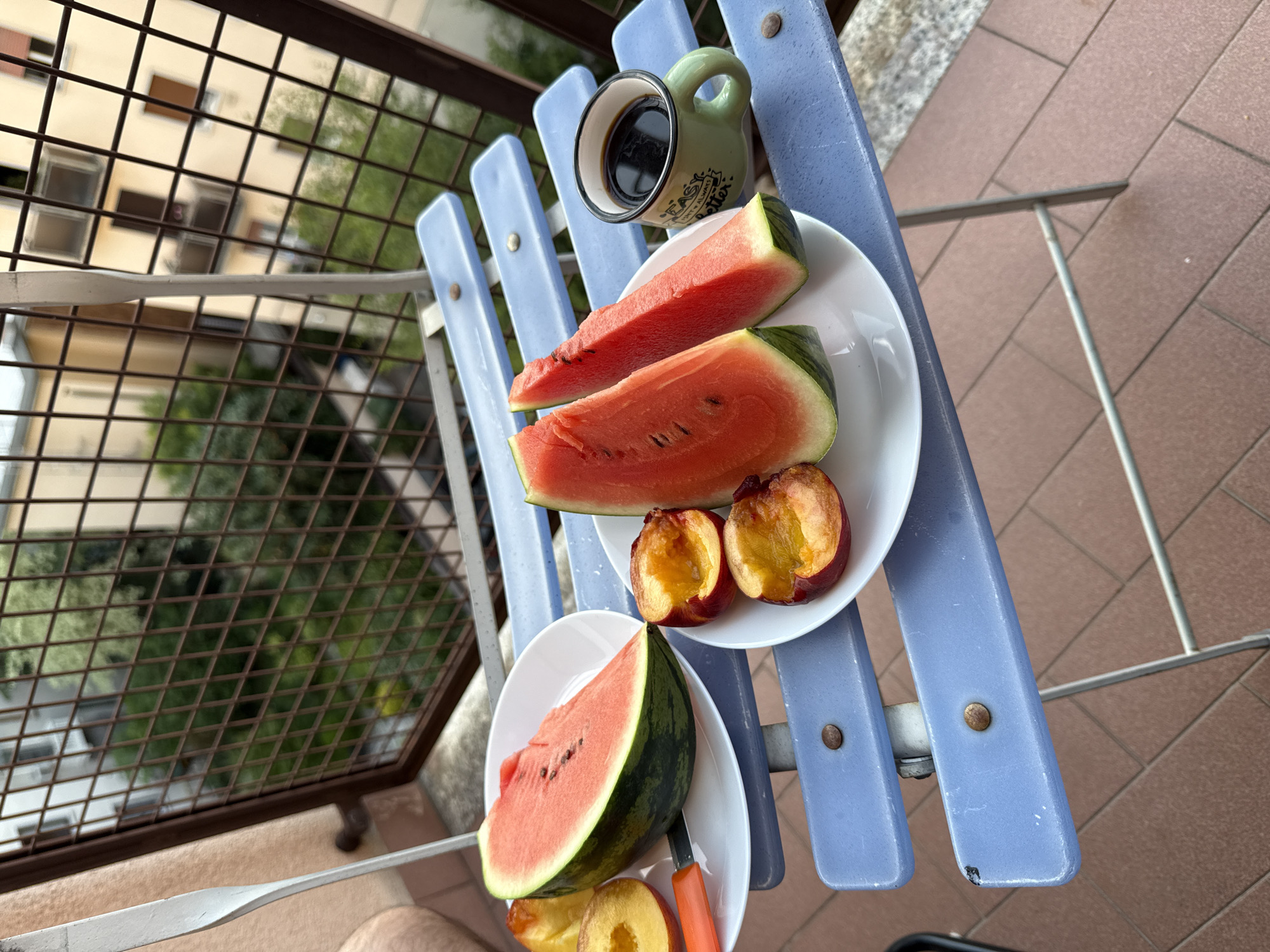 Summer fruit and coffee arranged on Milan balcony