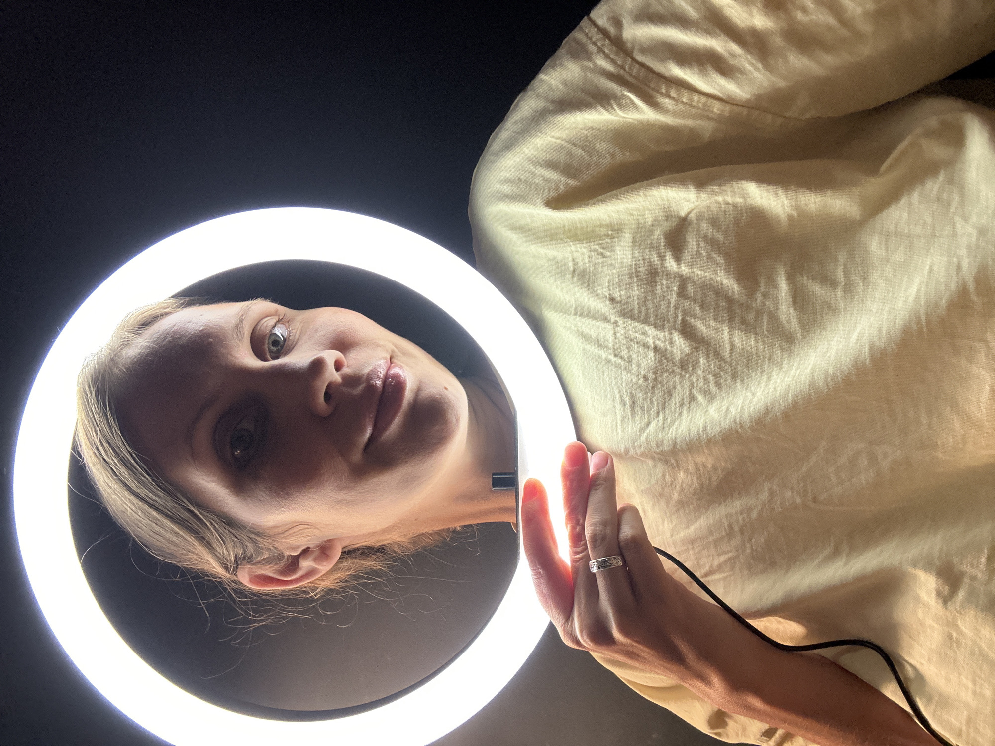 Woman experiments with ring light setup in Fethiye