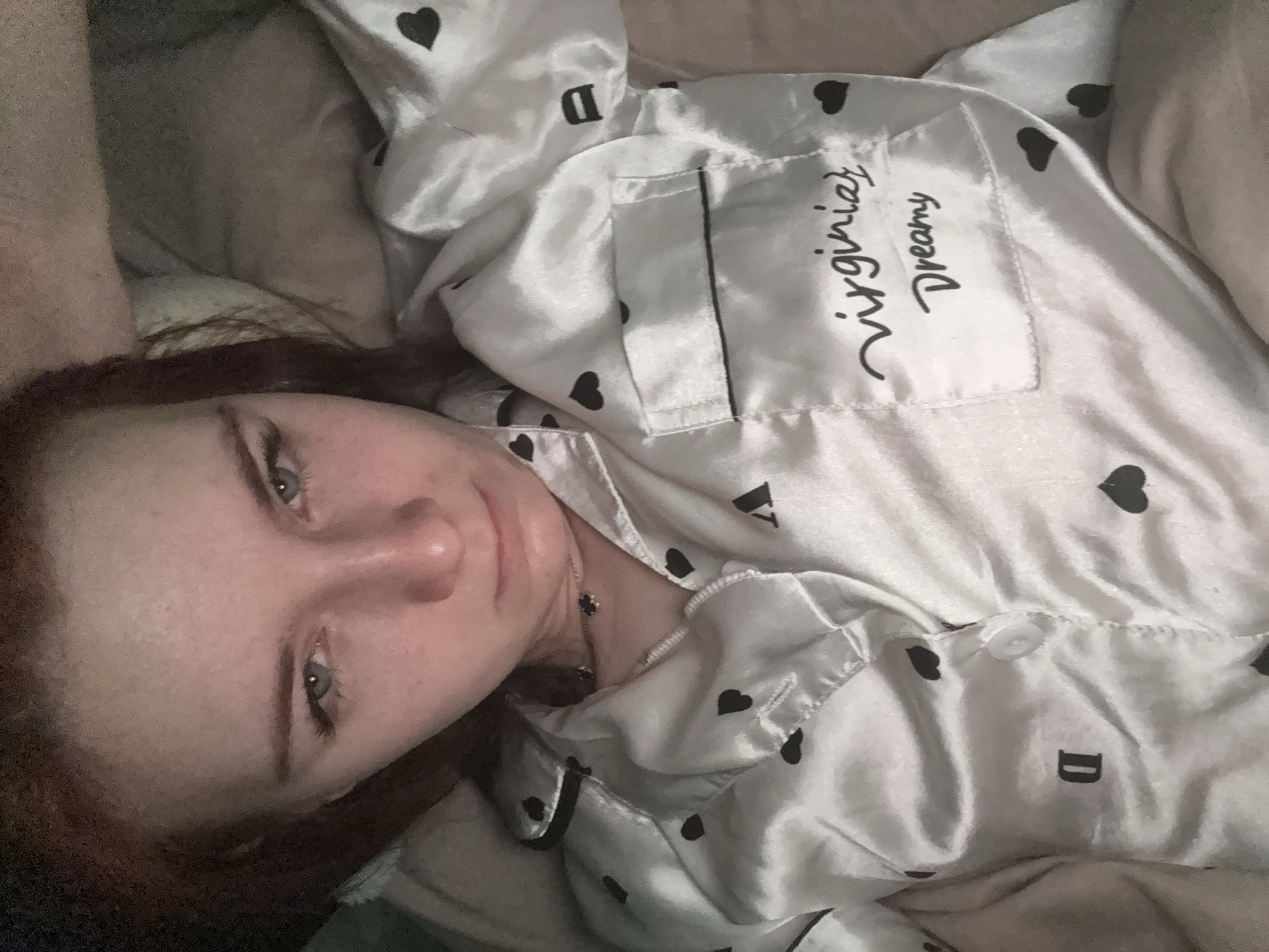 Woman rests in bed during morning hours in Russia