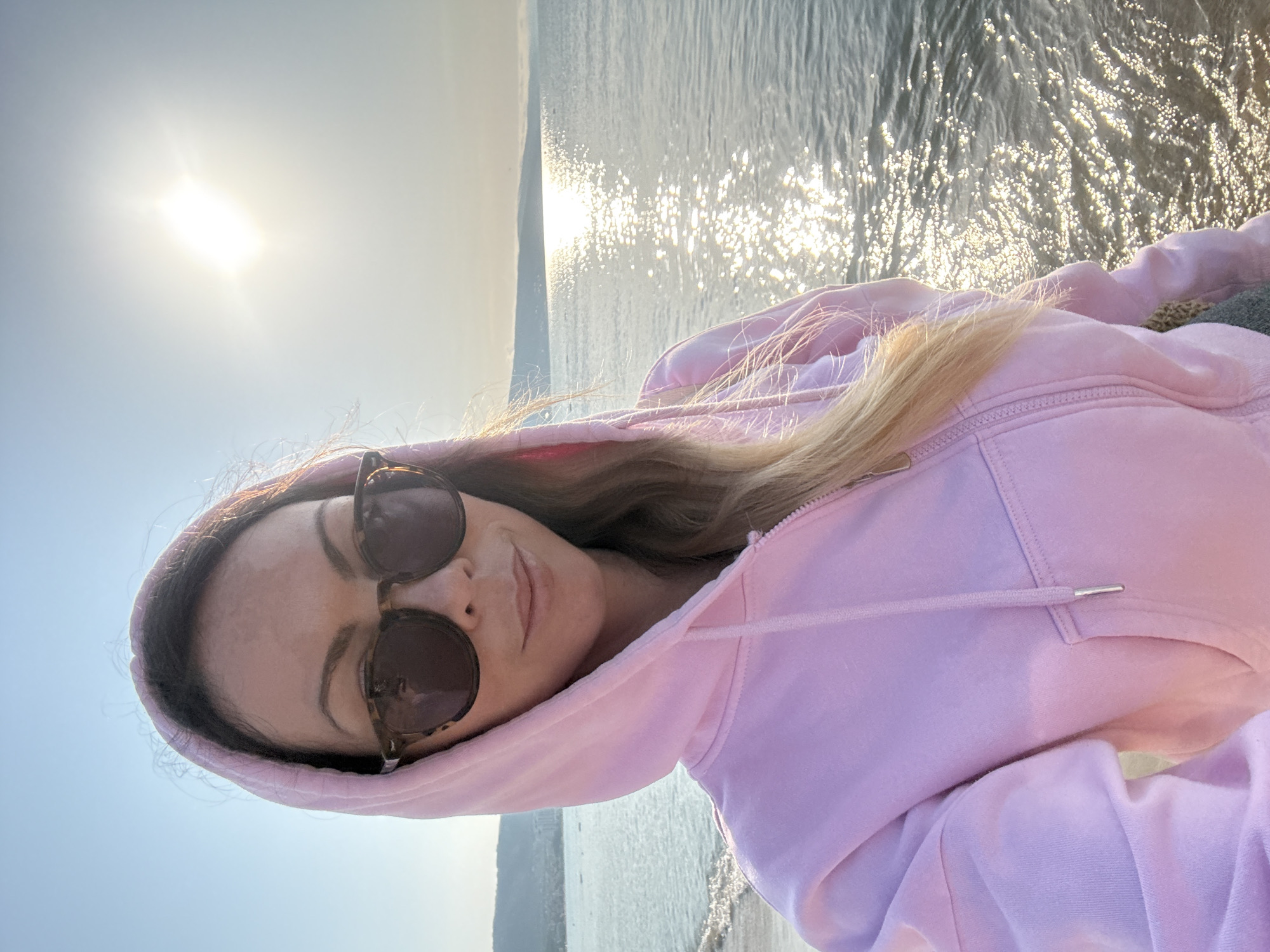 Woman takes coastal selfie in Nesebar, Bulgaria