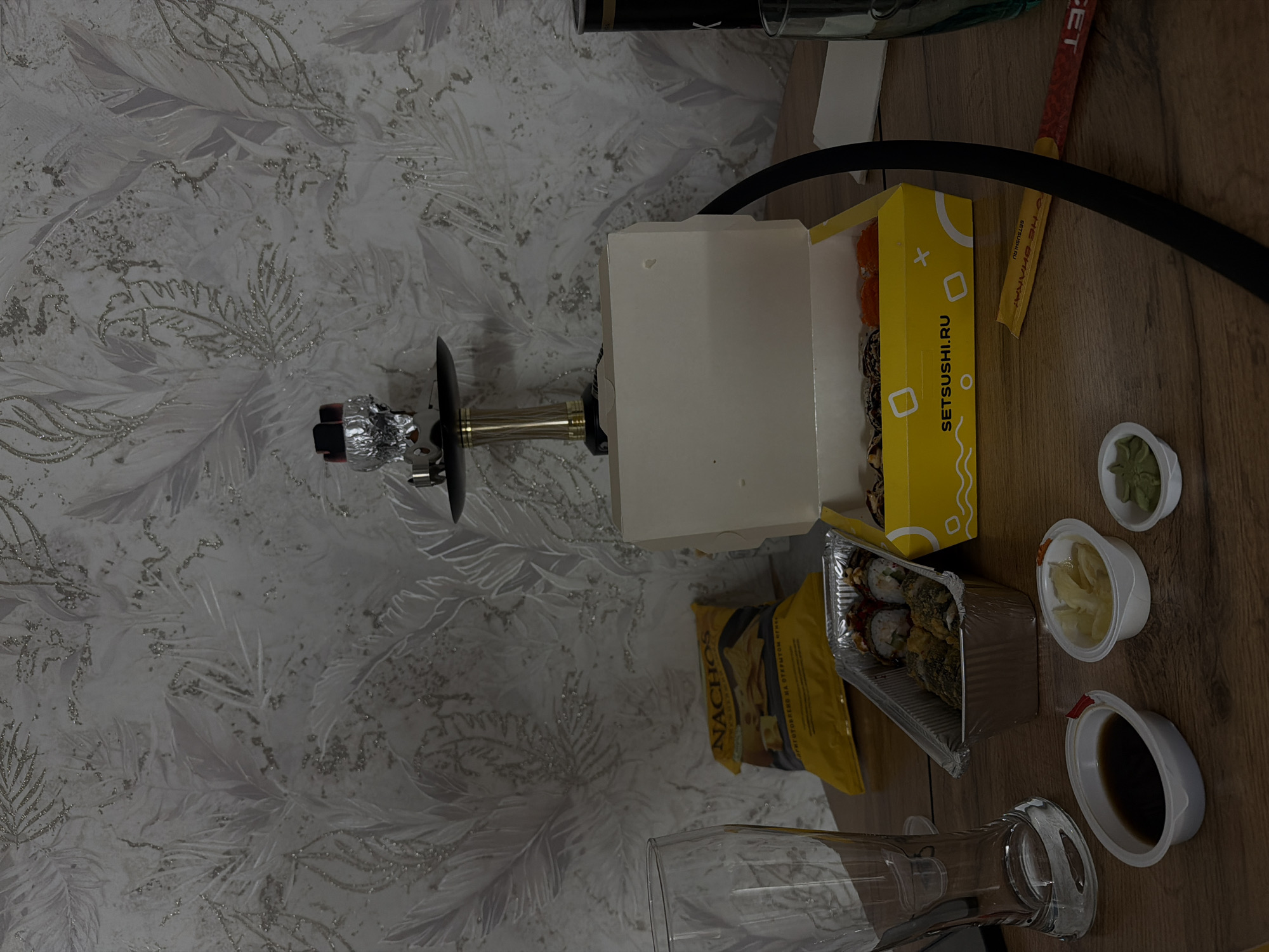 Casual sushi dinner and hookah session documented in Reshetnikovo