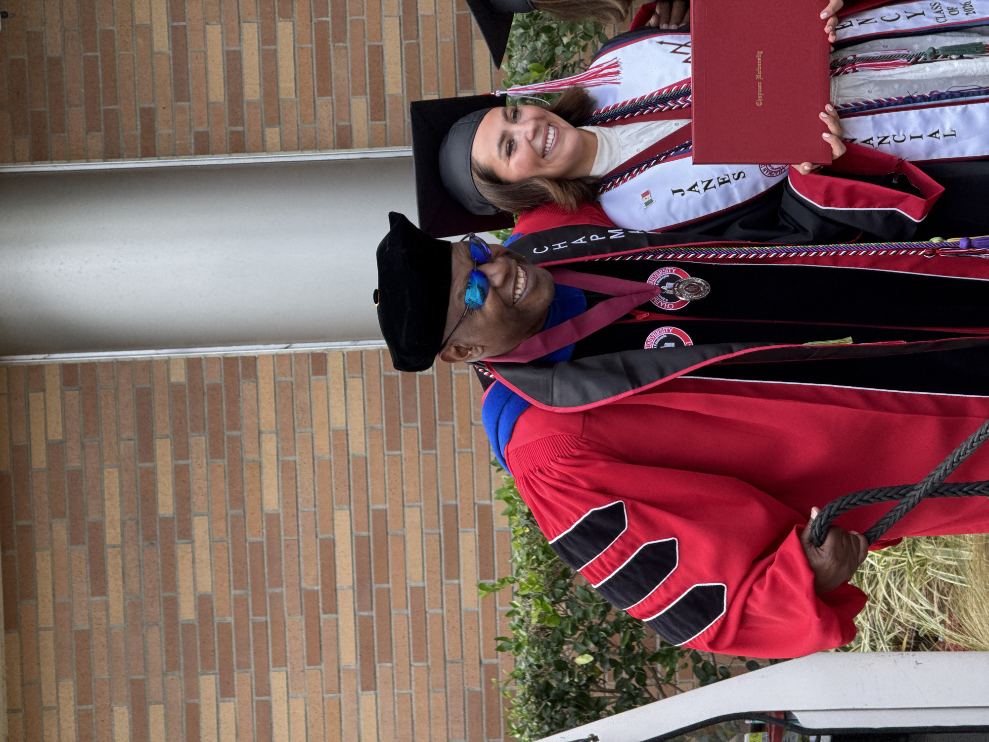 Dog dons graduation cap and gown at Chapman University