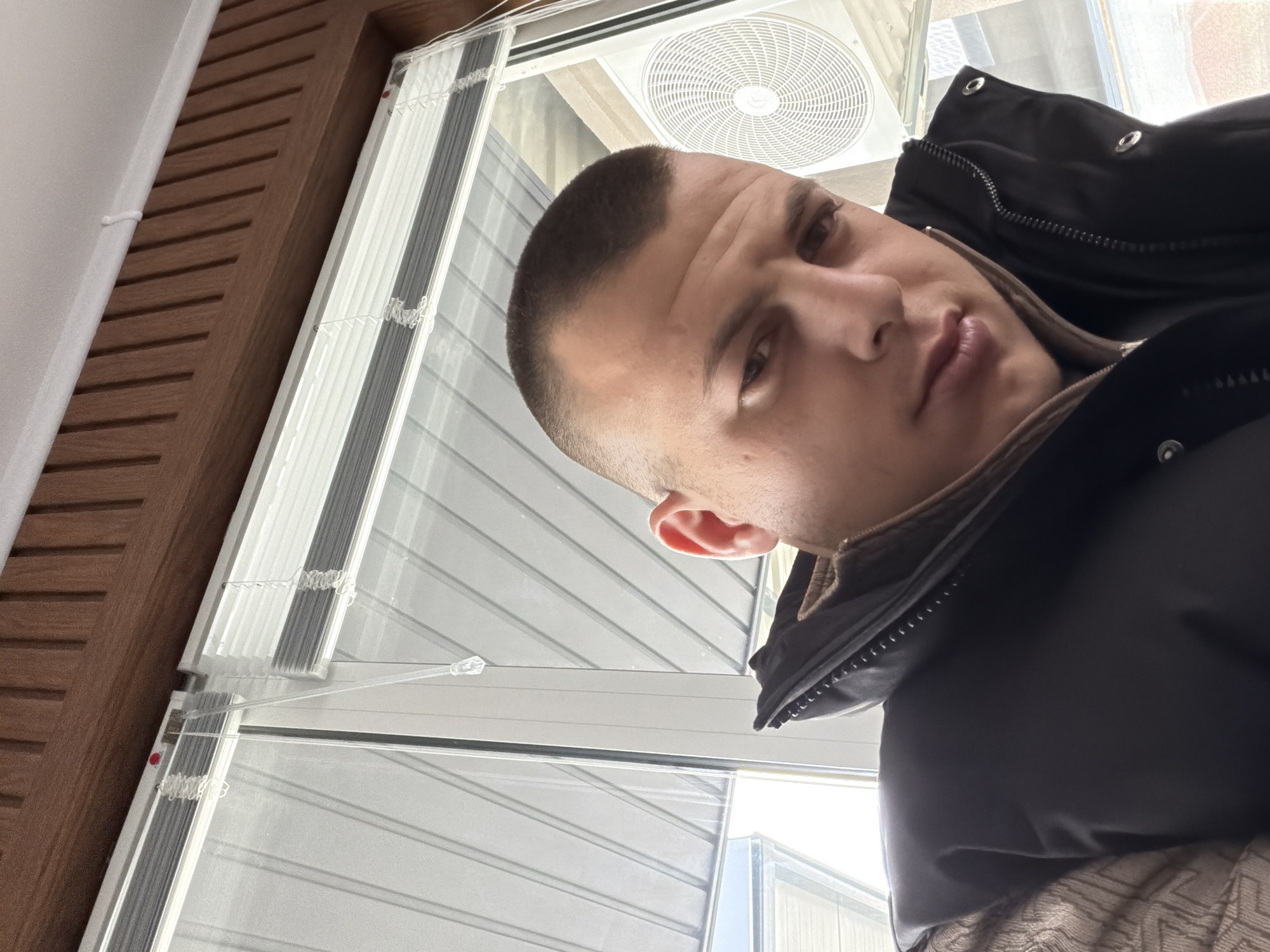 Man photographed indoors in close-up shot in Malevo, Bulgaria