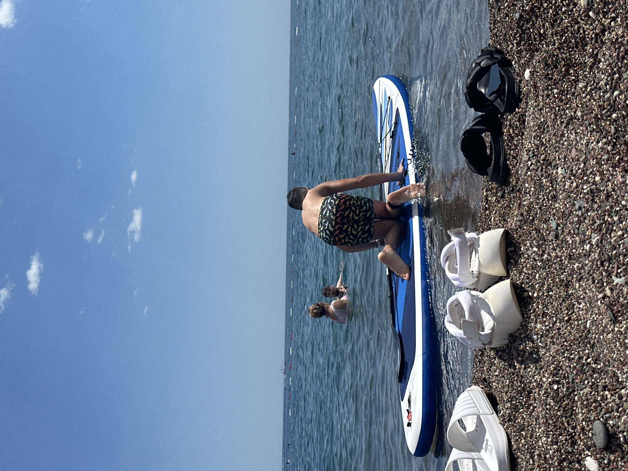 Parasailing and paddleboarding off the Boreti coast