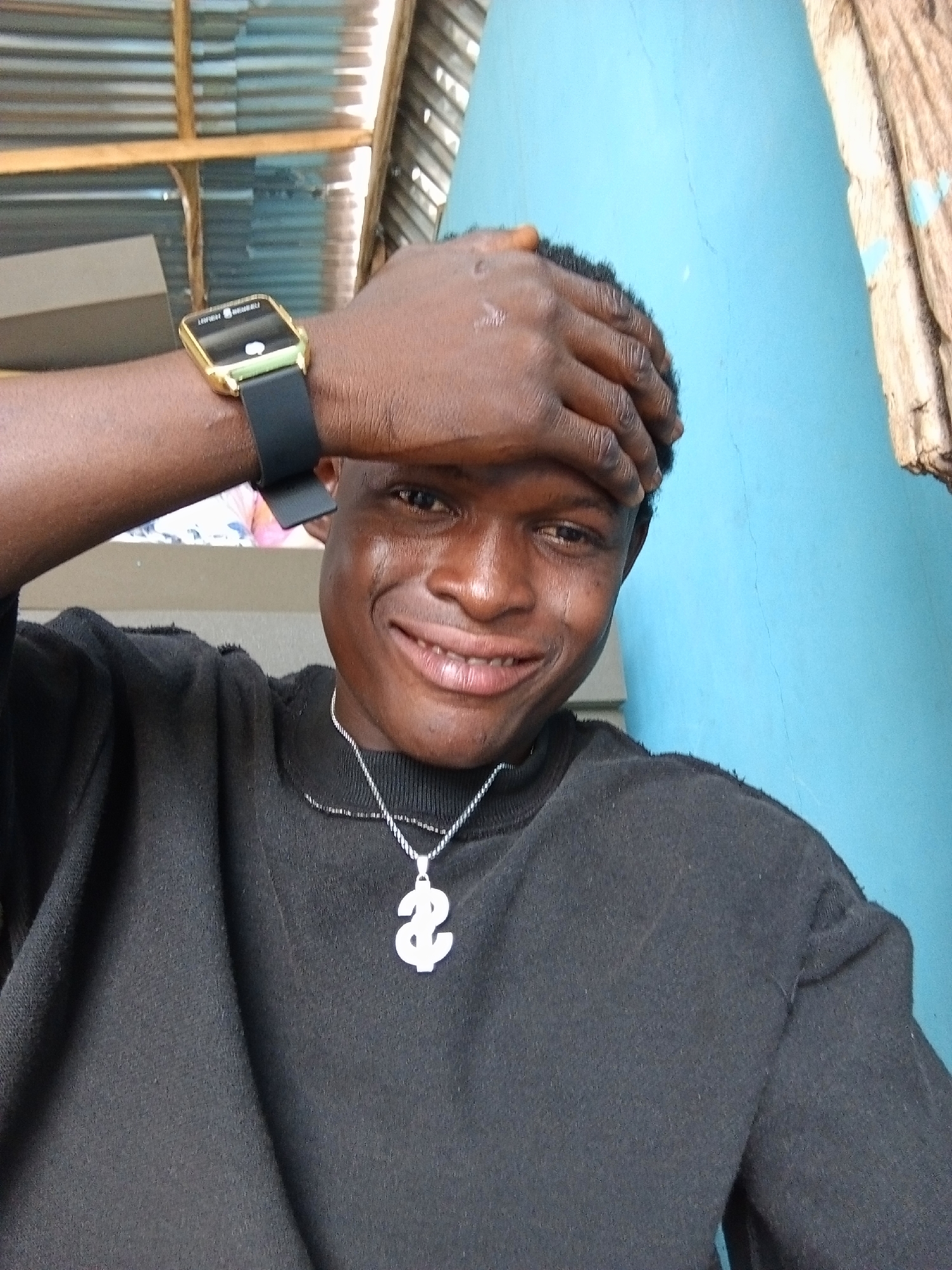 Young man documents afternoon in Ado, Nigeria markets