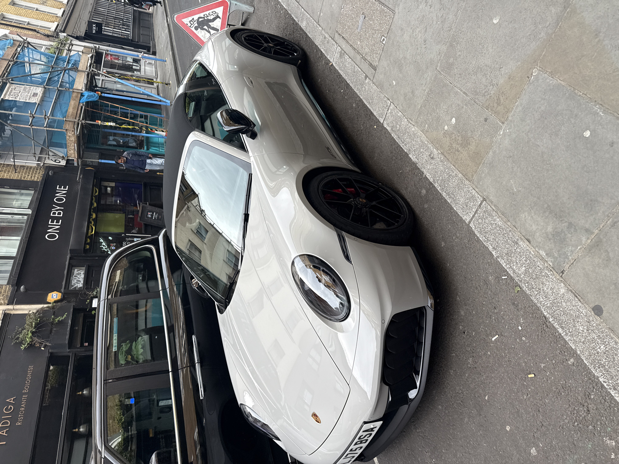 Afternoon street scenes and parked Porsche documented in London