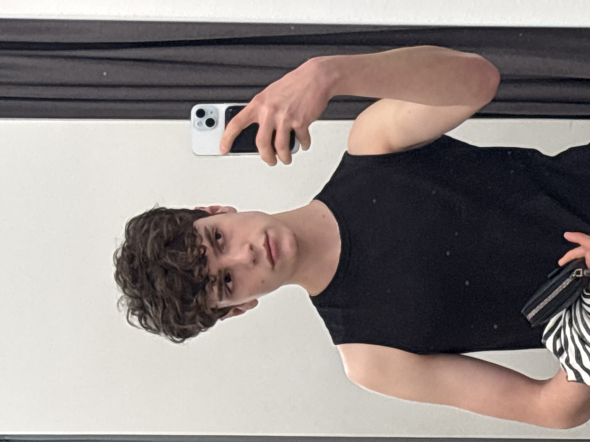 Young man takes selfies around Gyumri, Armenia