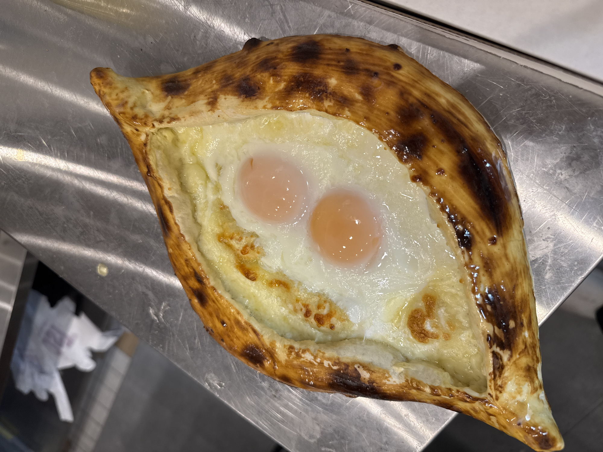 Traditional khachapuri with eggs photographed in Yerevan