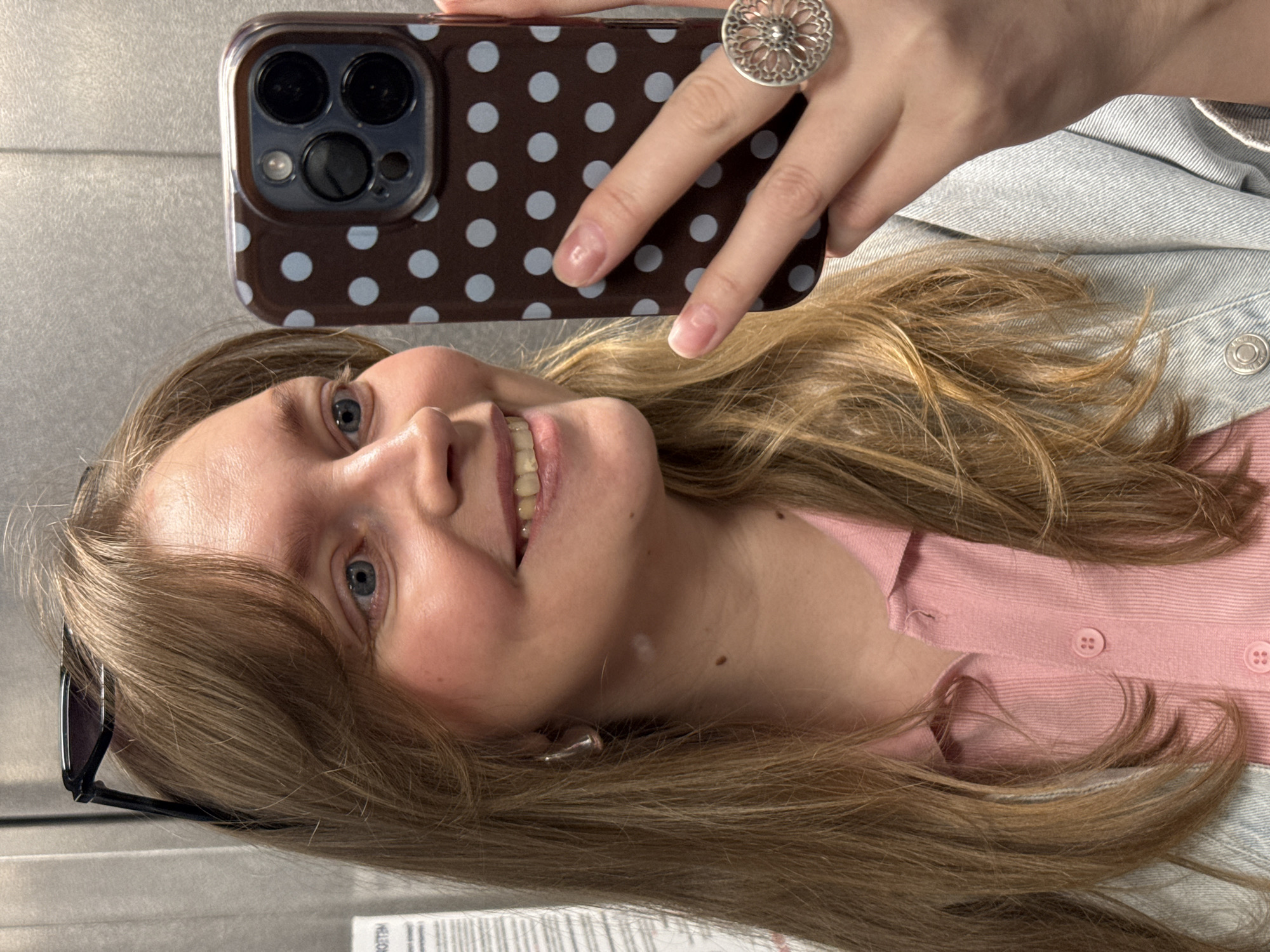 Woman takes selfies at hair salon in Izhevsk