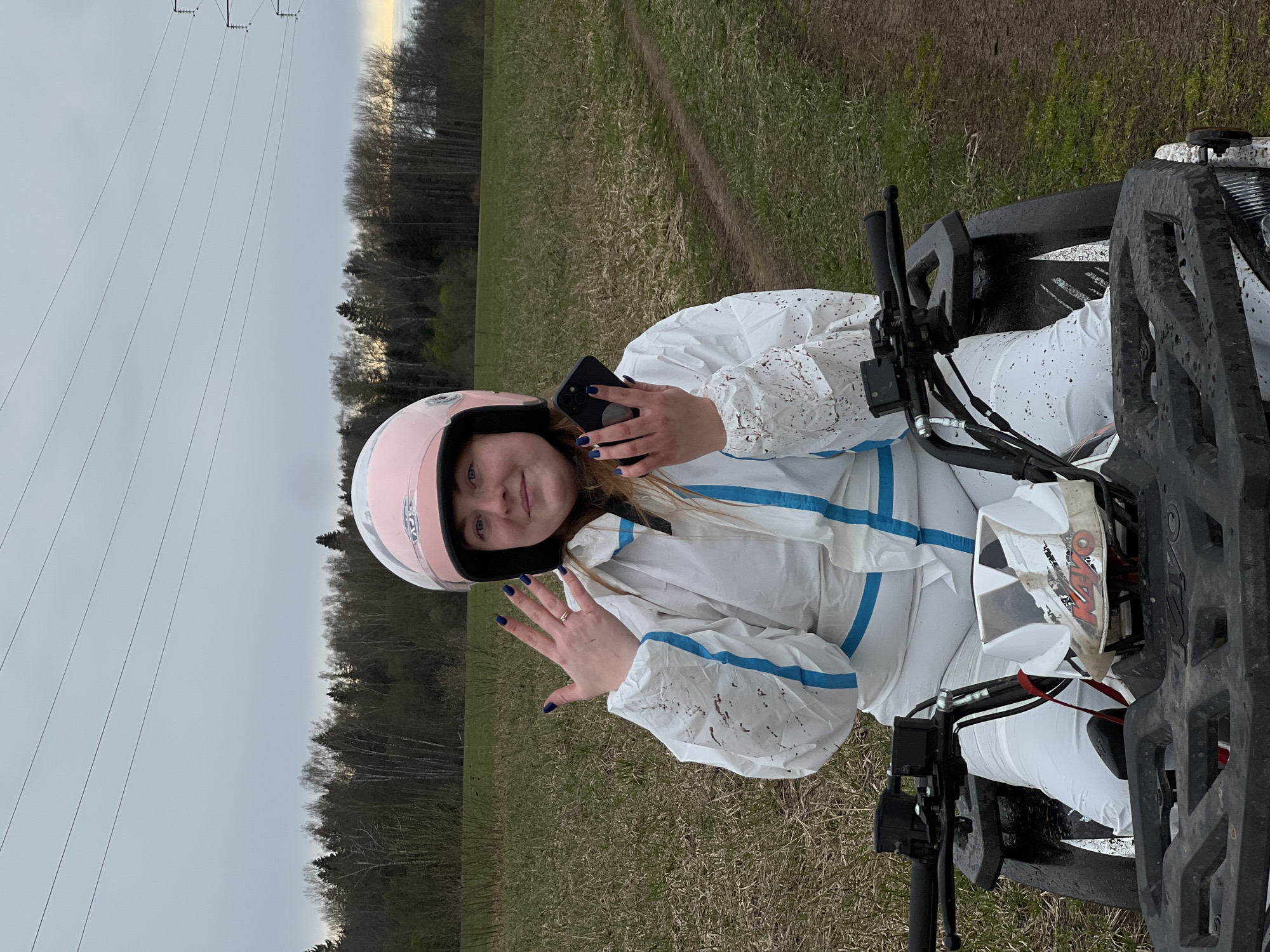 ATV rider in protective gear spotted in Russian field