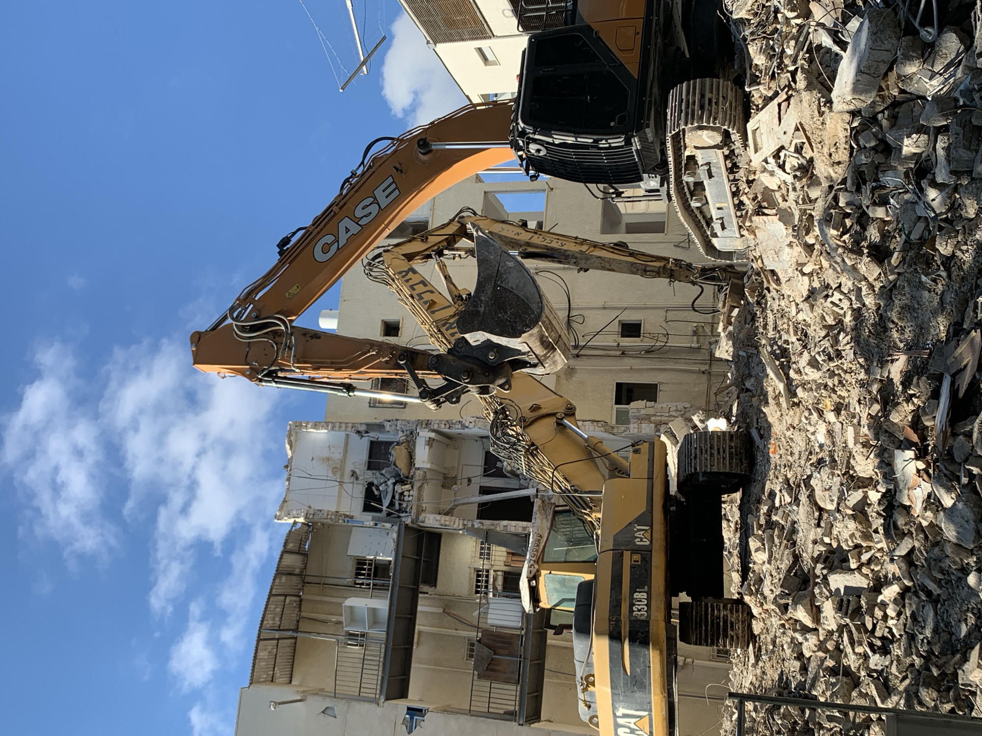 Ordinary Tel Aviv moments: demolition, street cleaning, dogs, gelato