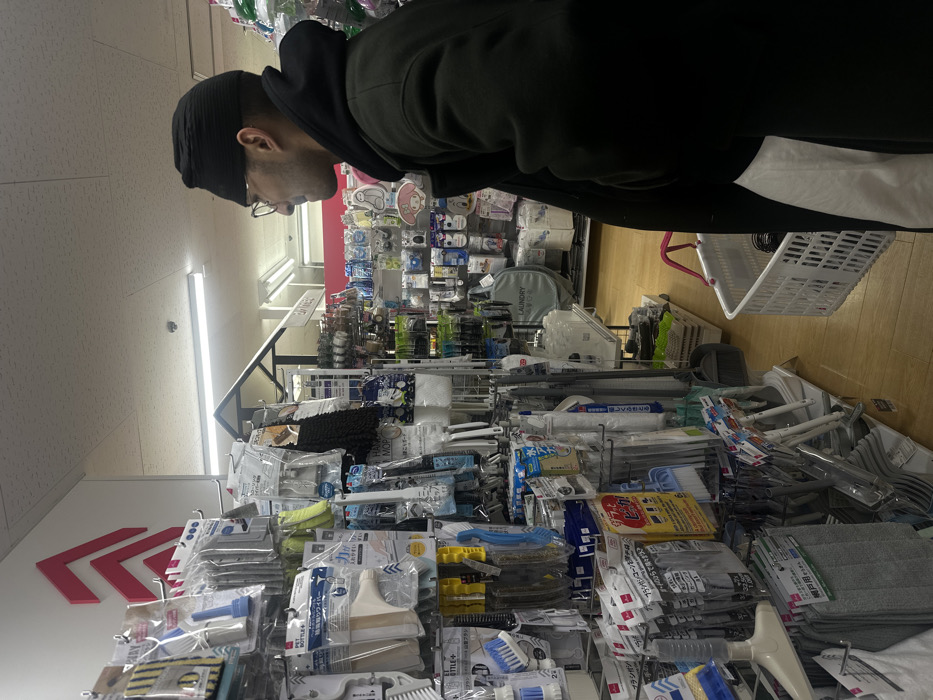 Shopper browses merchandise at Shinagawa retail store