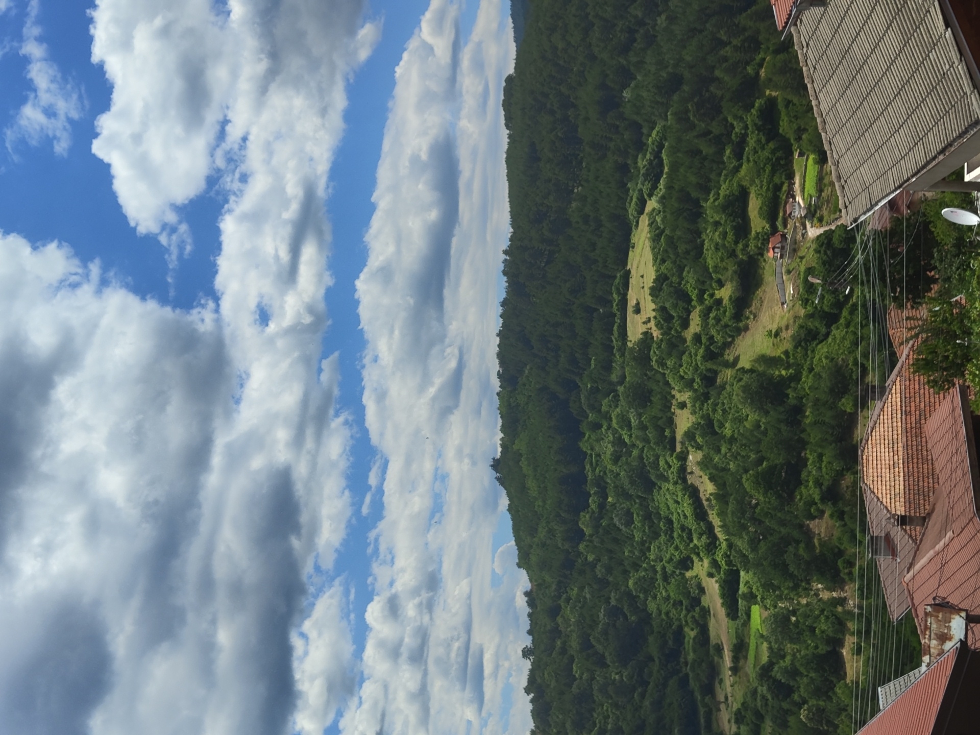 Forested hills and rural settlement in Pletena, Bulgaria