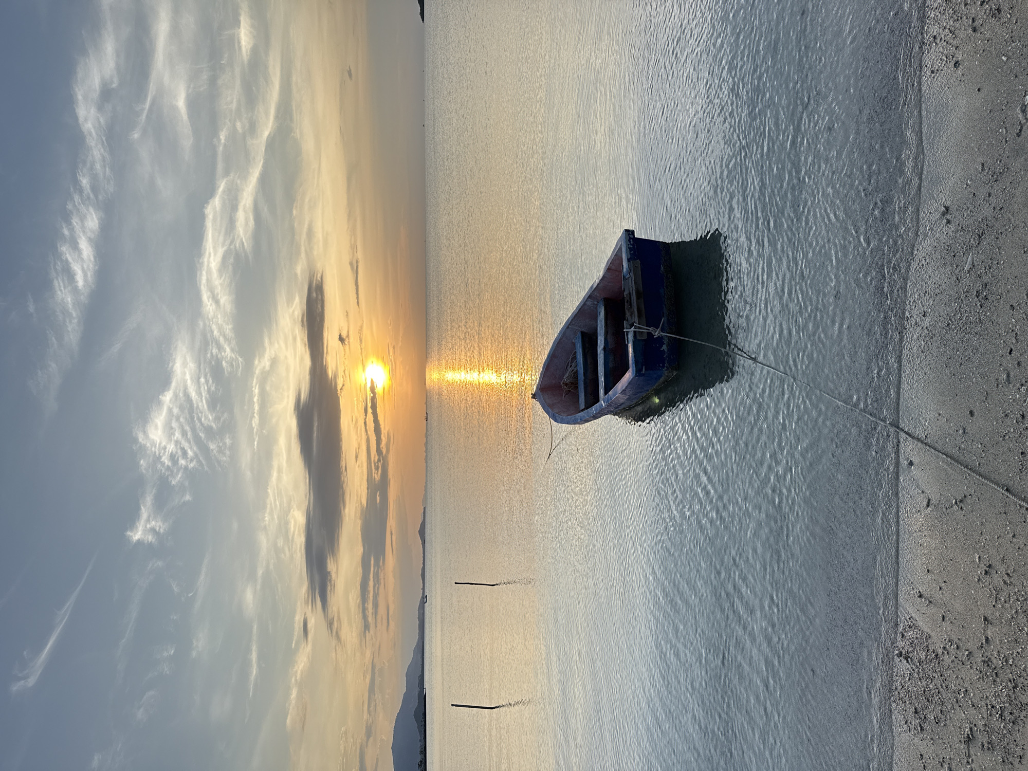 Ko Samui sunset: boats, infinity pools, and passing planes
