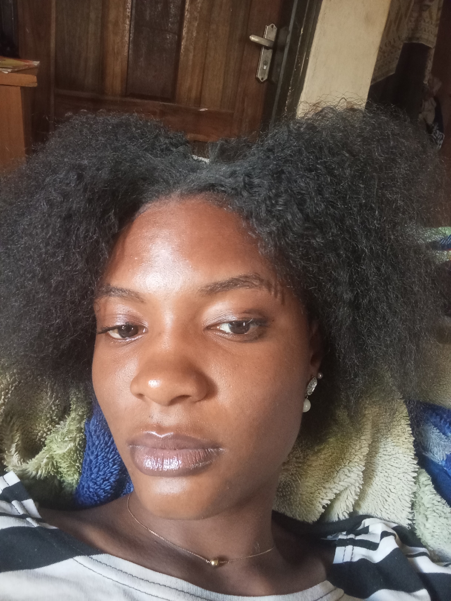 Young woman photographed multiple times across Jos, Nigeria