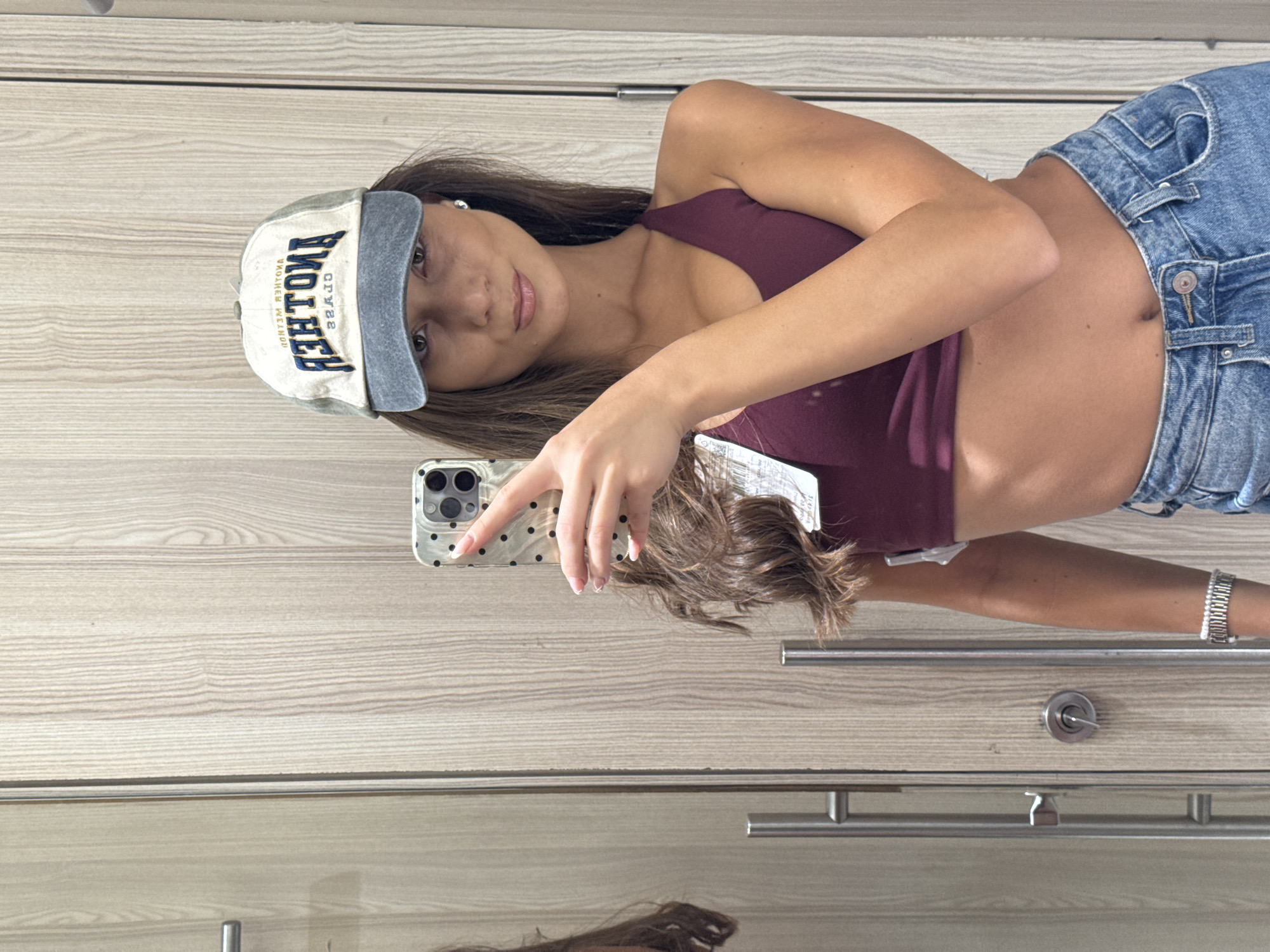 Woman takes mirror selfies in Burgas dressing room