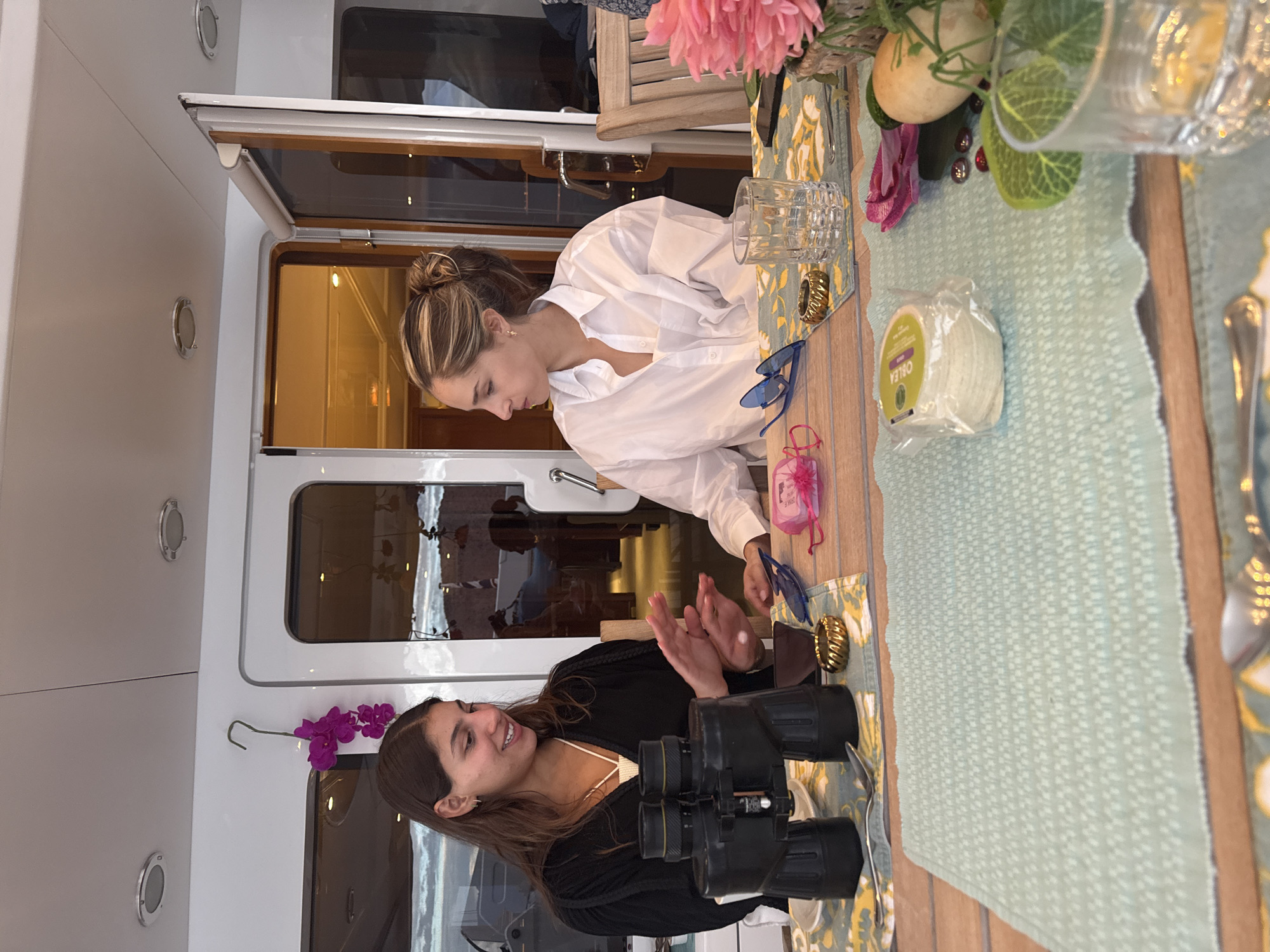 Two women dining at table in Mexico