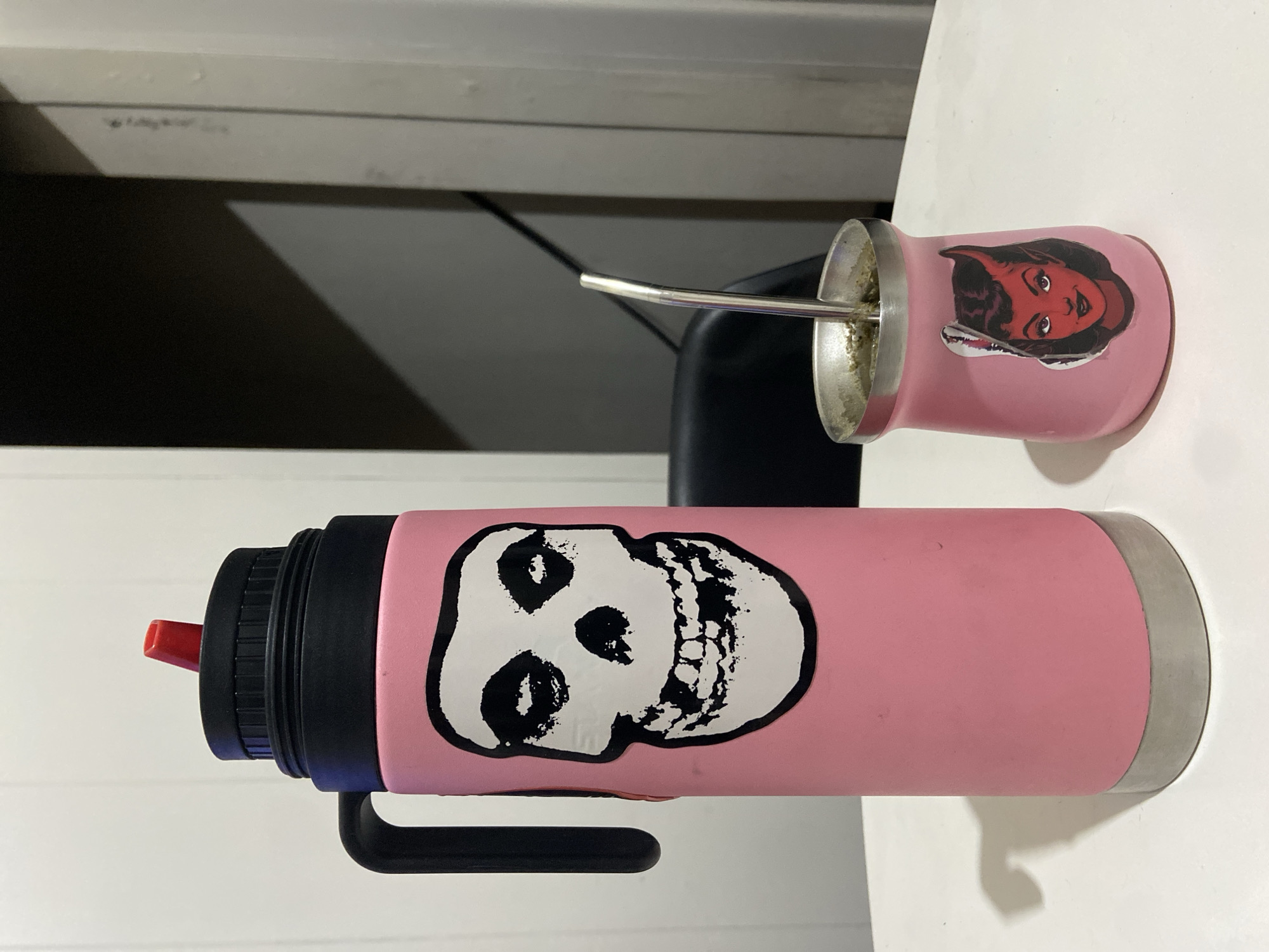 Pink containers spotted on white surface in Buenos Aires