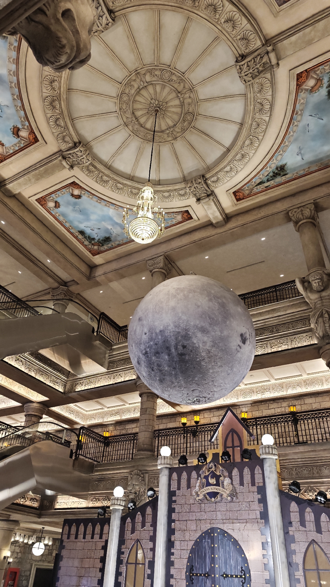 Grand indoor space with classical architecture and spherical structure documented