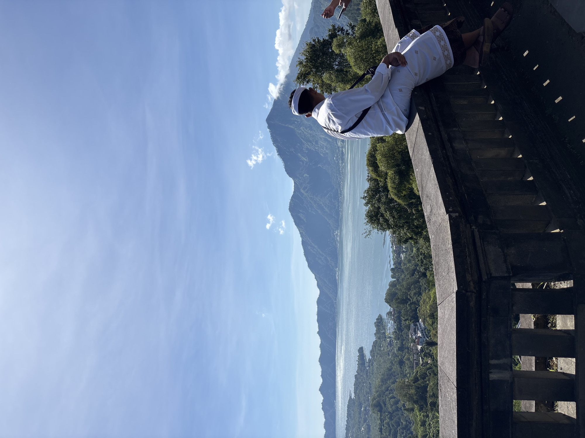 Tourists document scenic Lake Batur views in Kintamani, Indonesia