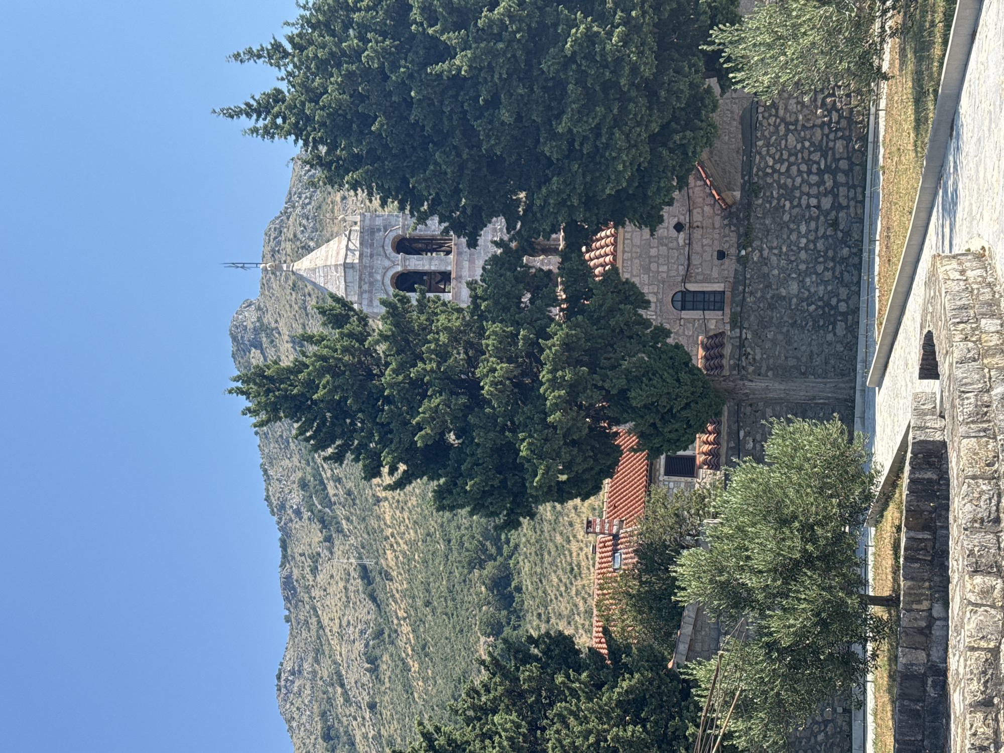 Clifftop ruins, grapevines, and sea views in coastal Montenegro