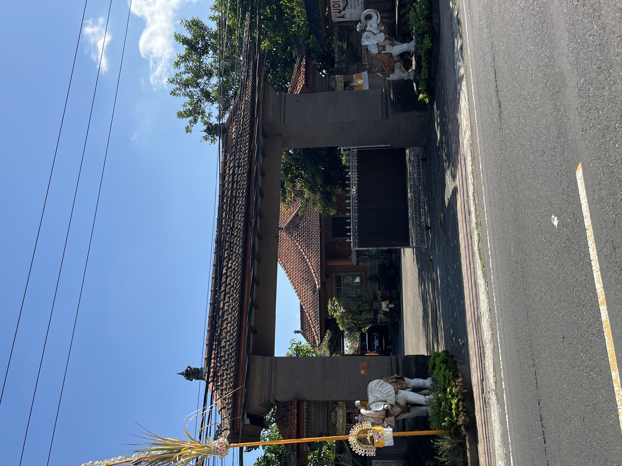 Balinese temple gates and ornate elephant statues in Sukawati