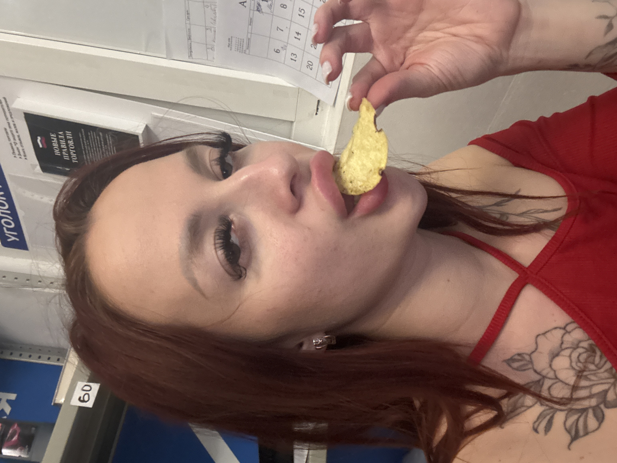 Woman enjoys Lay's chips in casual snacking moment