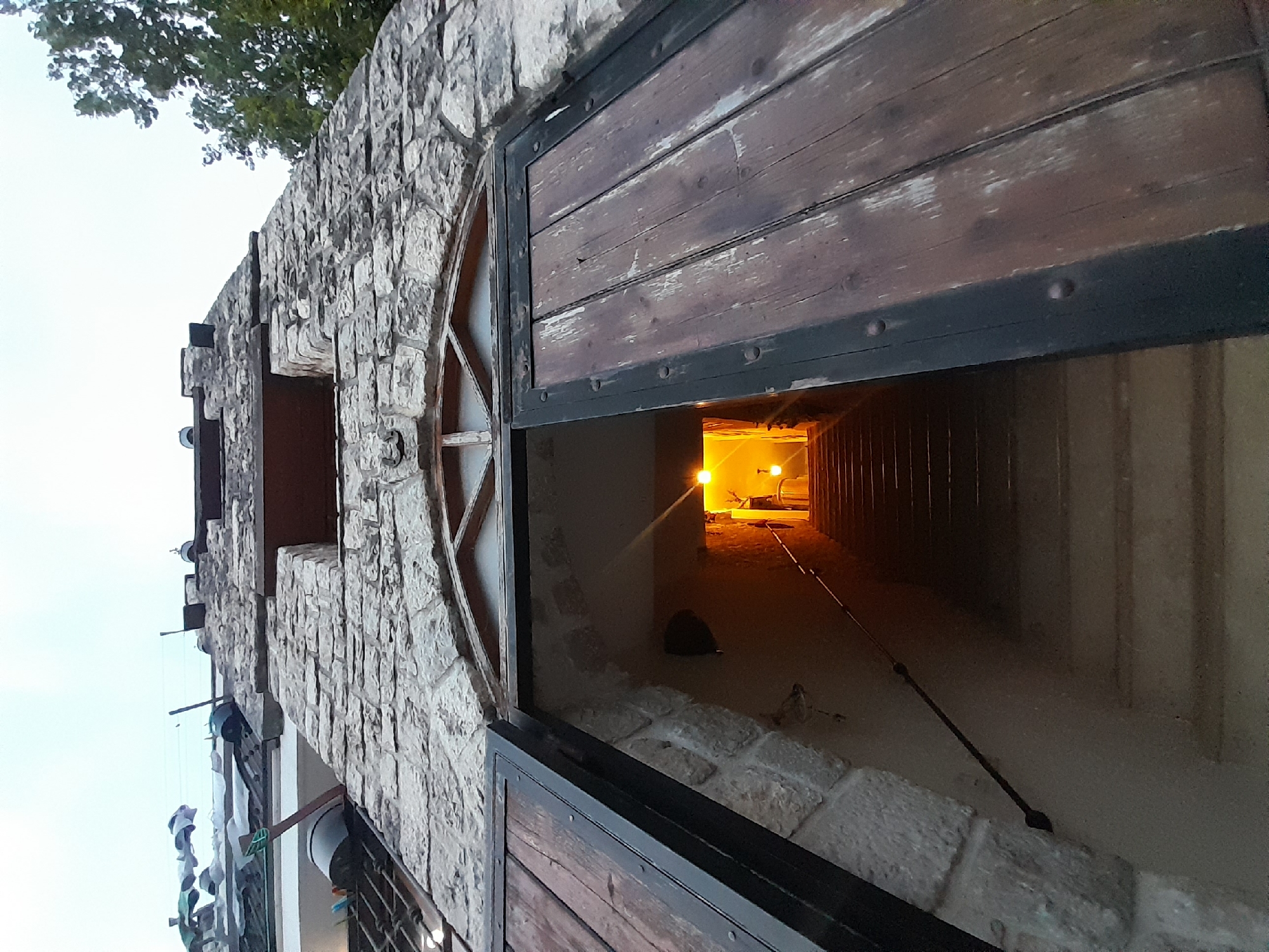 Tourist explores historic Montenegrin villages, documents stone buildings and boats