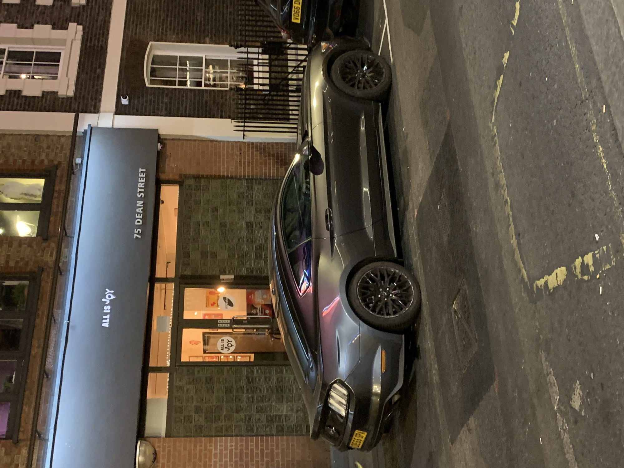 Gray Ford Mustang spotted parked on Dean Street, London