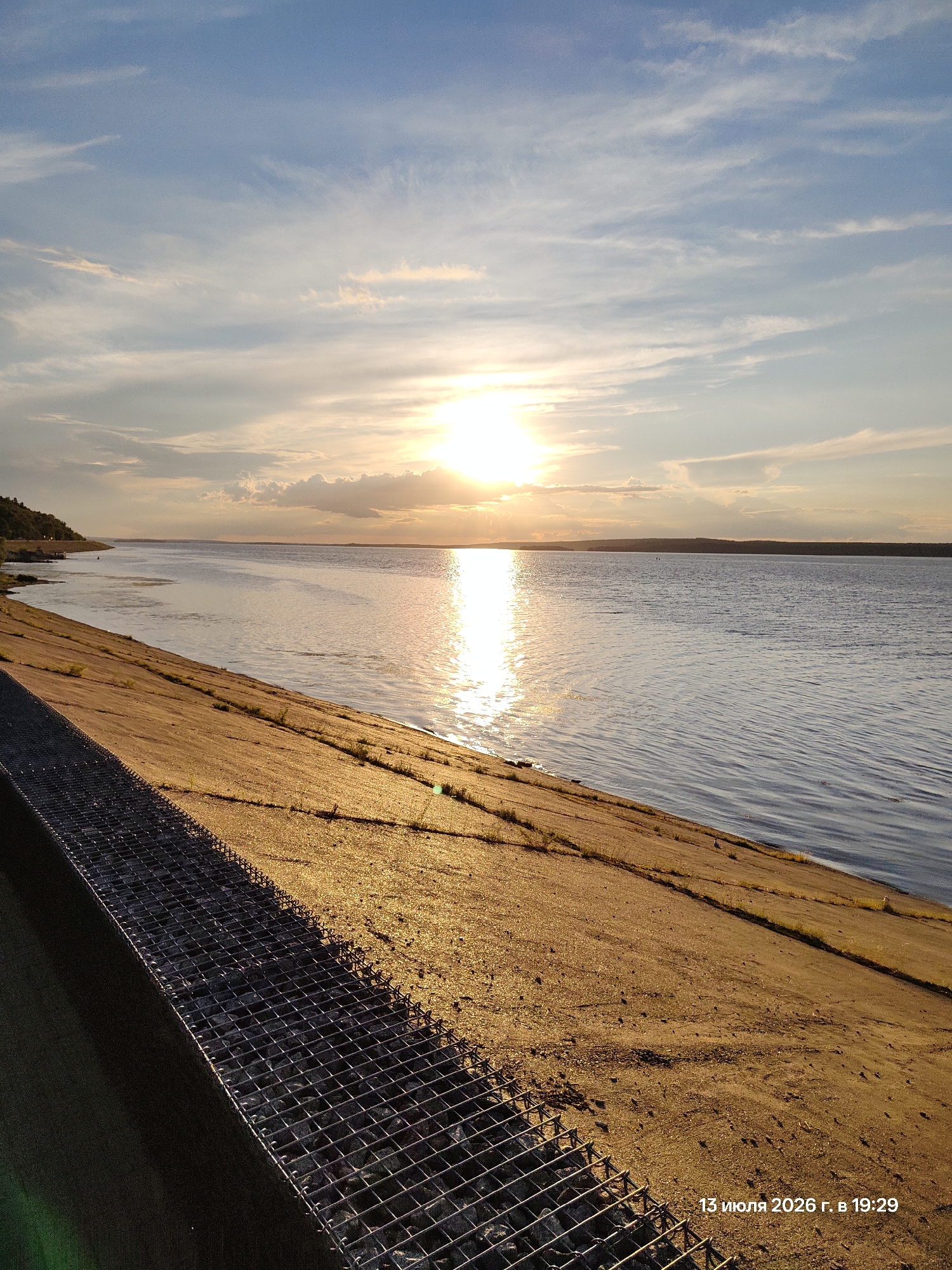 Sunset stroll along an ornate riverside promenade