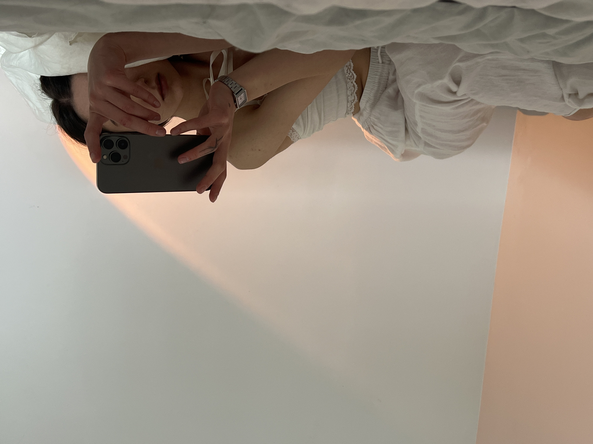 Woman documents morning selfie session in Ternopil bedroom
