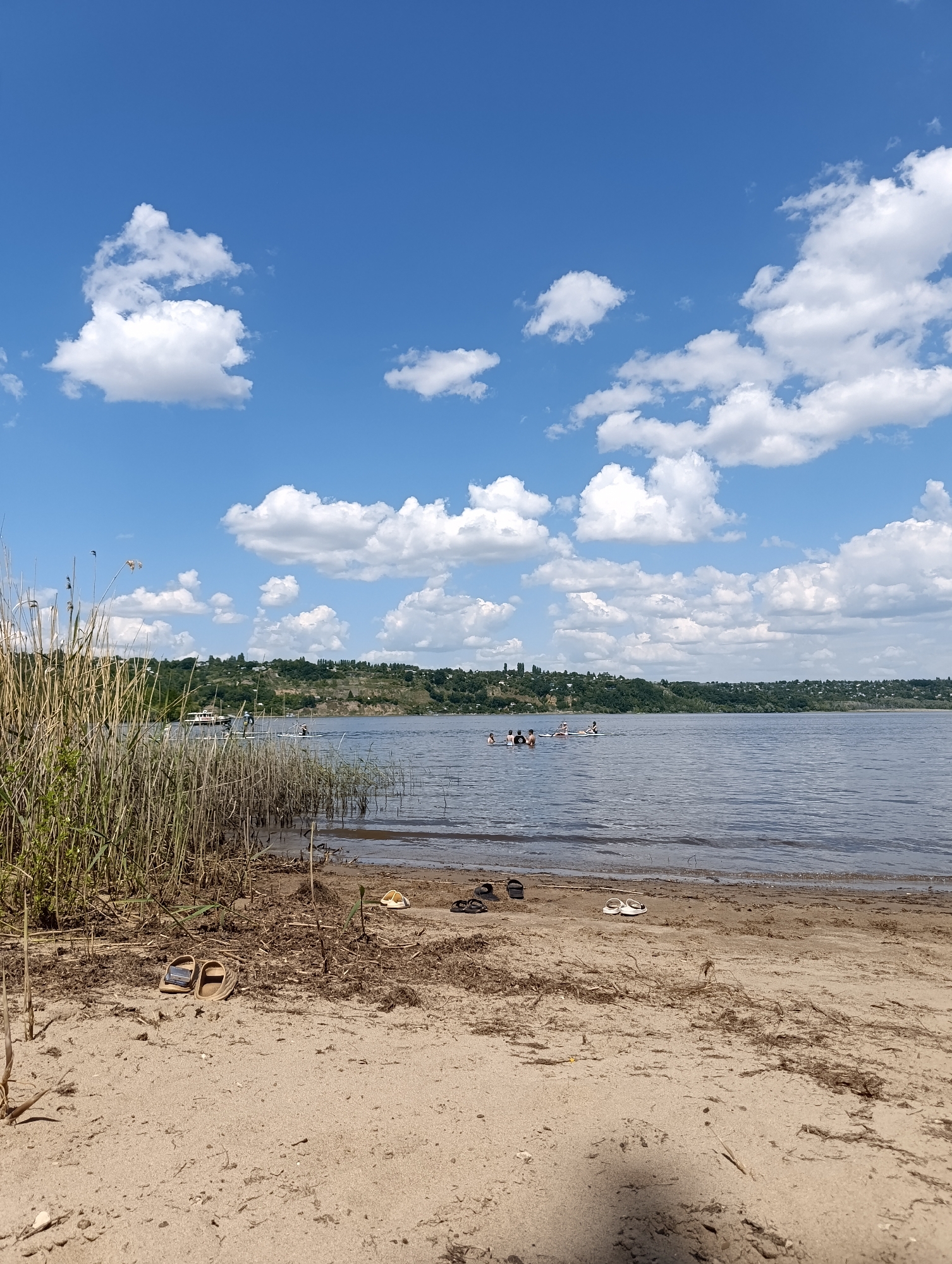 Woman enjoys summer sunbathing session at Saratov river beach