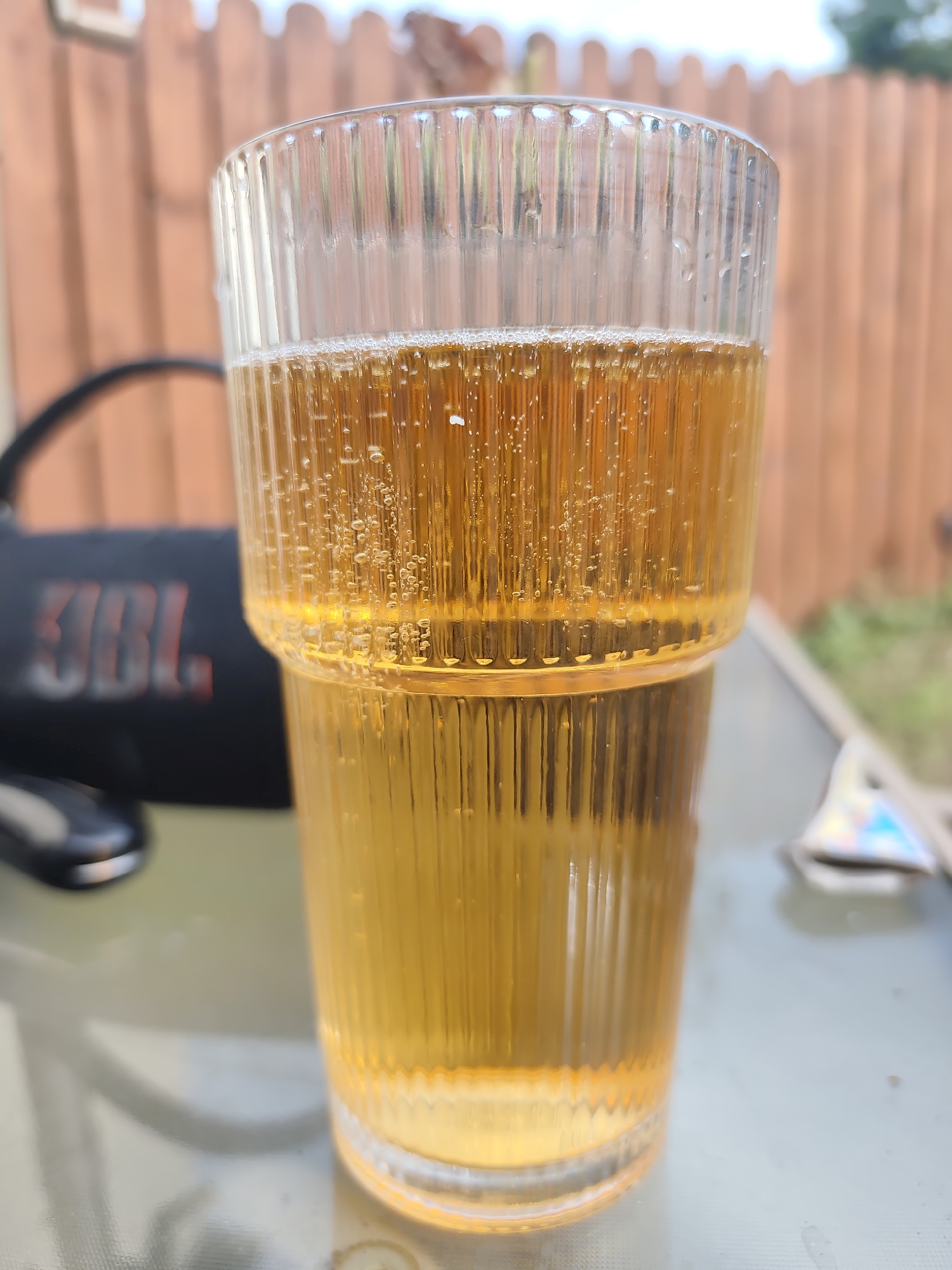 Drinks, a vape, and cloudy skies at an Irish outdoor hangout